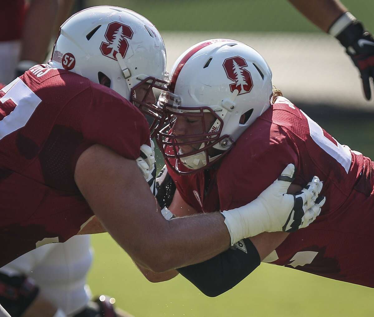 Stanford center Graham Shuler (right) faces off against Johnny Caspers during practice at Stanford University on Saturday, Aug. 15, 2015.