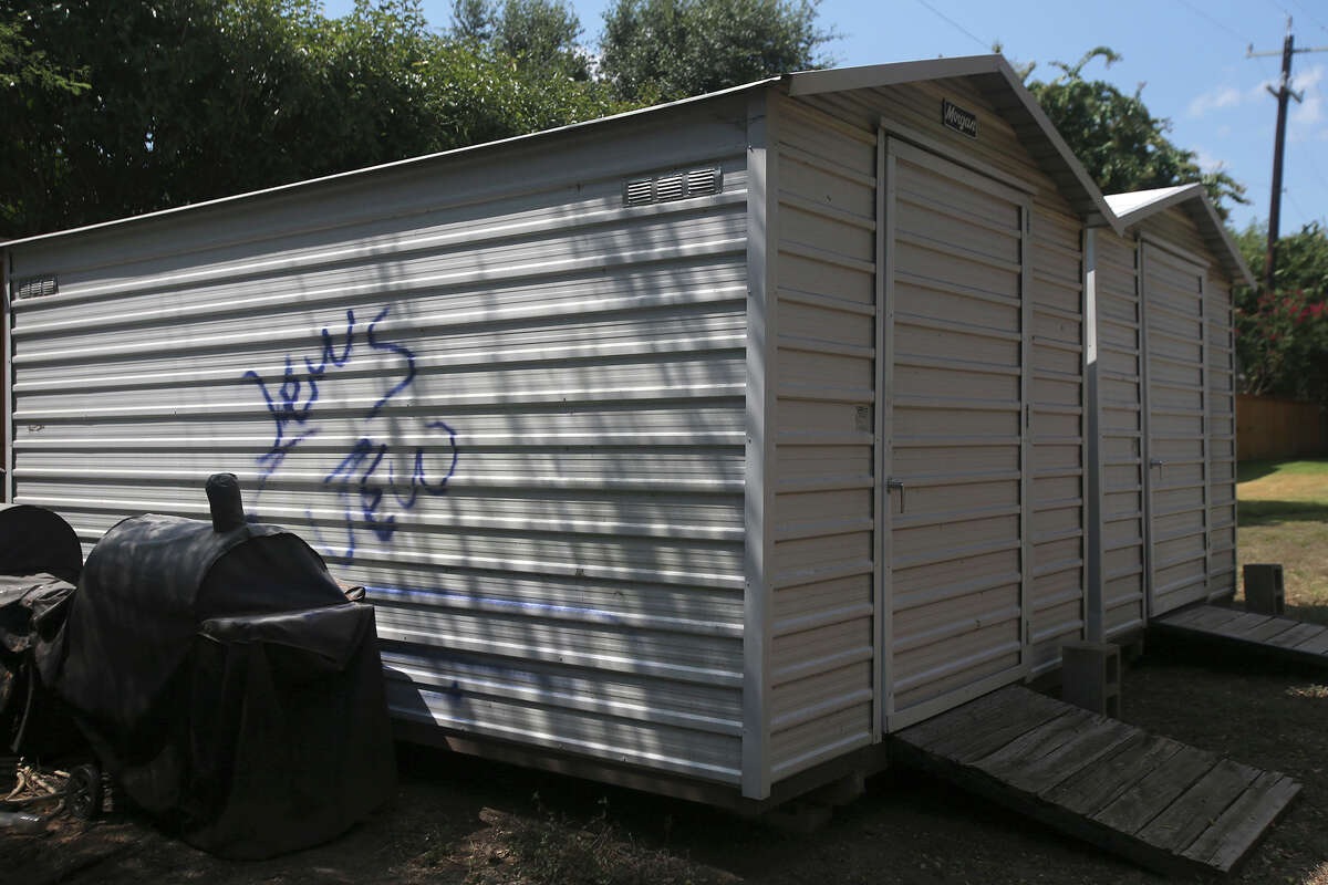 Grafitti on the side of a shed Monday August 17, 2015 at Cogregation Agudas Achim on the 16,000 block of Huebner appears to read "Jews Jew." The area near Congregation Rodfei Sholom on Northwest Military Highway was recently defaced with racist garfitti.