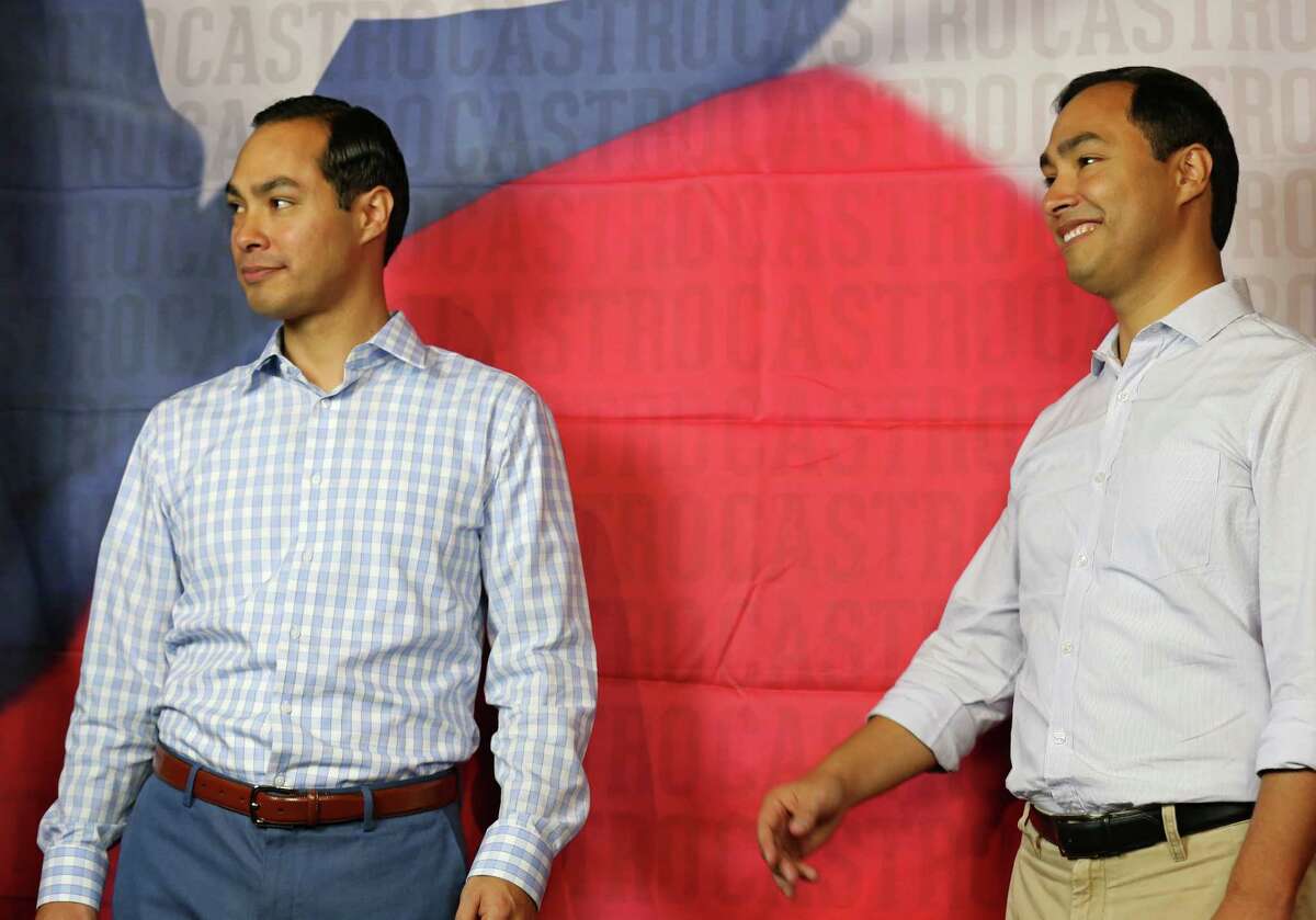 HUD Secretary Julian Castro (left) and his twin brother U.S. Rep. Joaquin Castro, D-San Antonio, pose for photos during their 40th birthday celebration held Sept. 15, 2014 at the Tobin Center for the Performing Arts. Sec. Castro said on "The Diane Rehm Show" on NPR that he doesn’t see his brother as much as he thought he would.