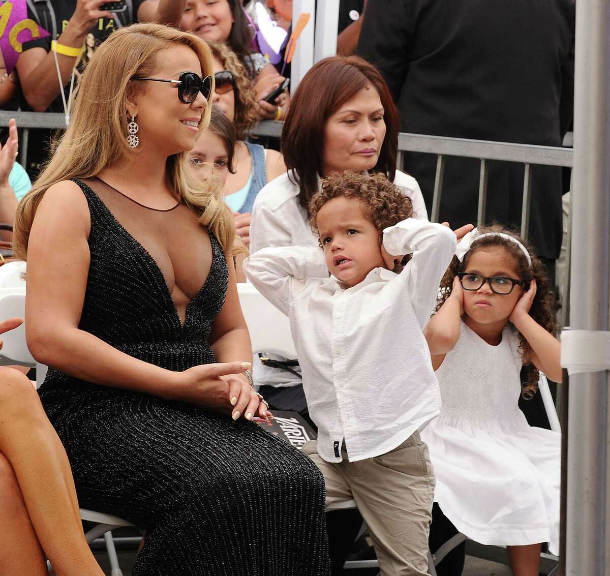 HOLLYWOOD, CA - AUGUST 05: Mariah Carey and children Moroccan Scott Cannon and Monroe Cannon attend Carey's induction into the Hollywood Walk of Fame on August 5, 2015 in Hollywood, California. (Photo by Jason LaVeris/FilmMagic)