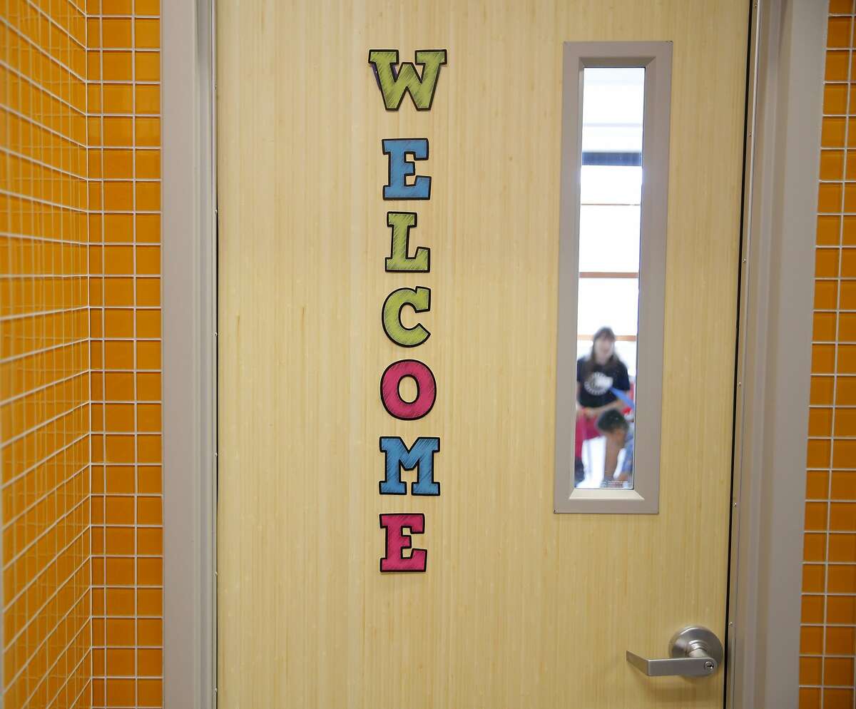 A "Welcome" sign on the door to a classroom during the first day of school at Willie L. Brown Jr. Middle School in San Francisco, California, on Monday, Aug. 17, 2015.