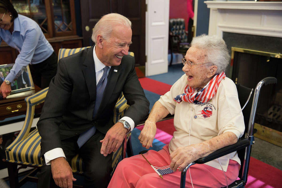 Vice President Joe Biden greets Lucy Coffey, 108, the oldest living female veteran, in his West Wing Office, July 25, 2014. (Official White House Photo by Lawrence Jackson)