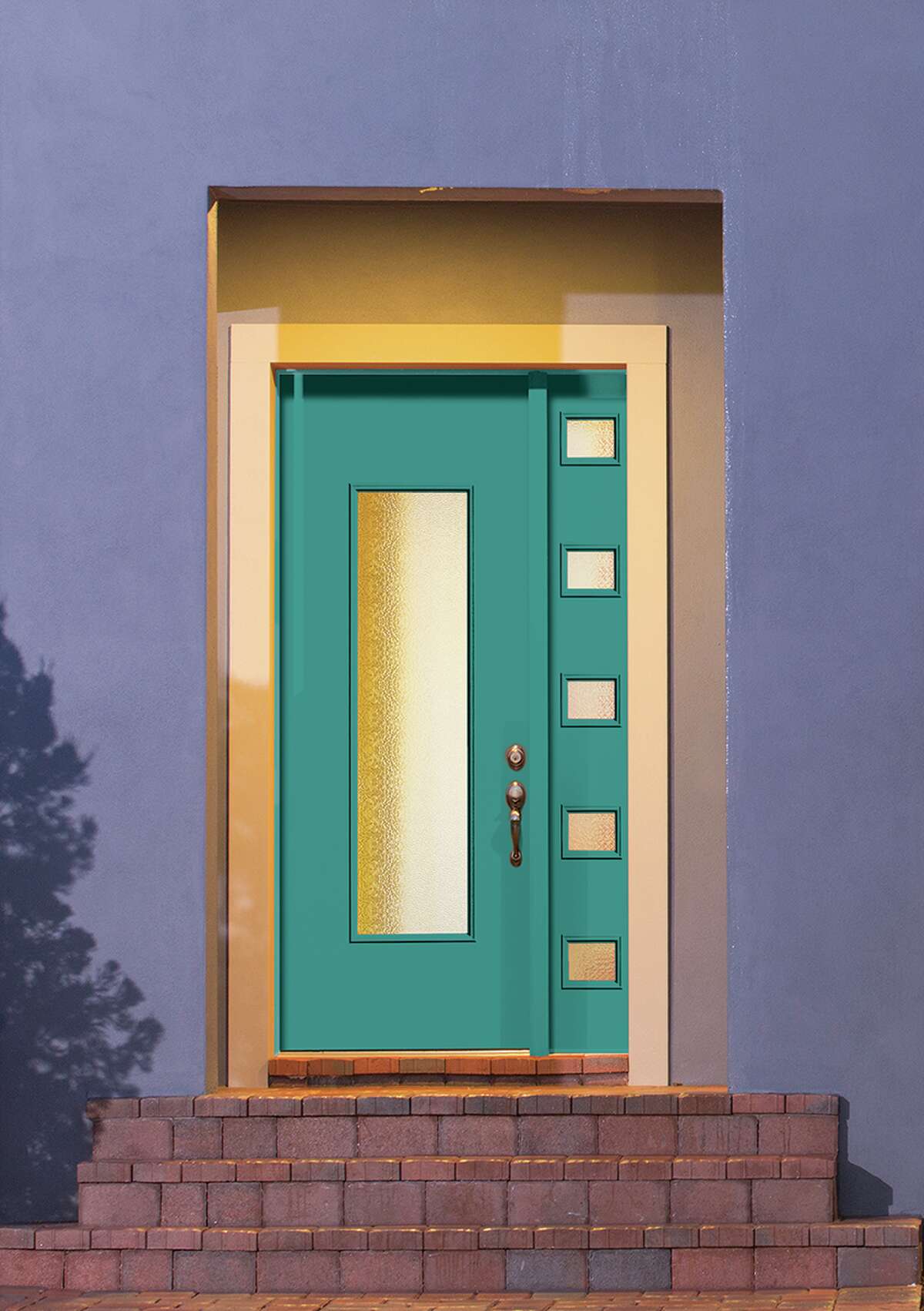 The front door is a place to get bold with exterior color. This Therma-Tru door is a deep turquoise, which color expert Kate Smith named a 2015 front-door trend color.