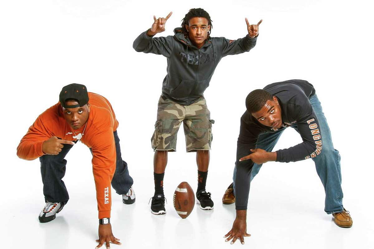 Future University of Texas football players, Paul Boyette Jr., Humble, (left to right), Marcus Johnson, Clear Springs, and Kennedy Estelle, Dawson, photographed in the Houston Chronicle Photo Studio, Wednesday, Jan. 25, 2012, in Houston. ( Michael Paulsen / Houston Chronicle )