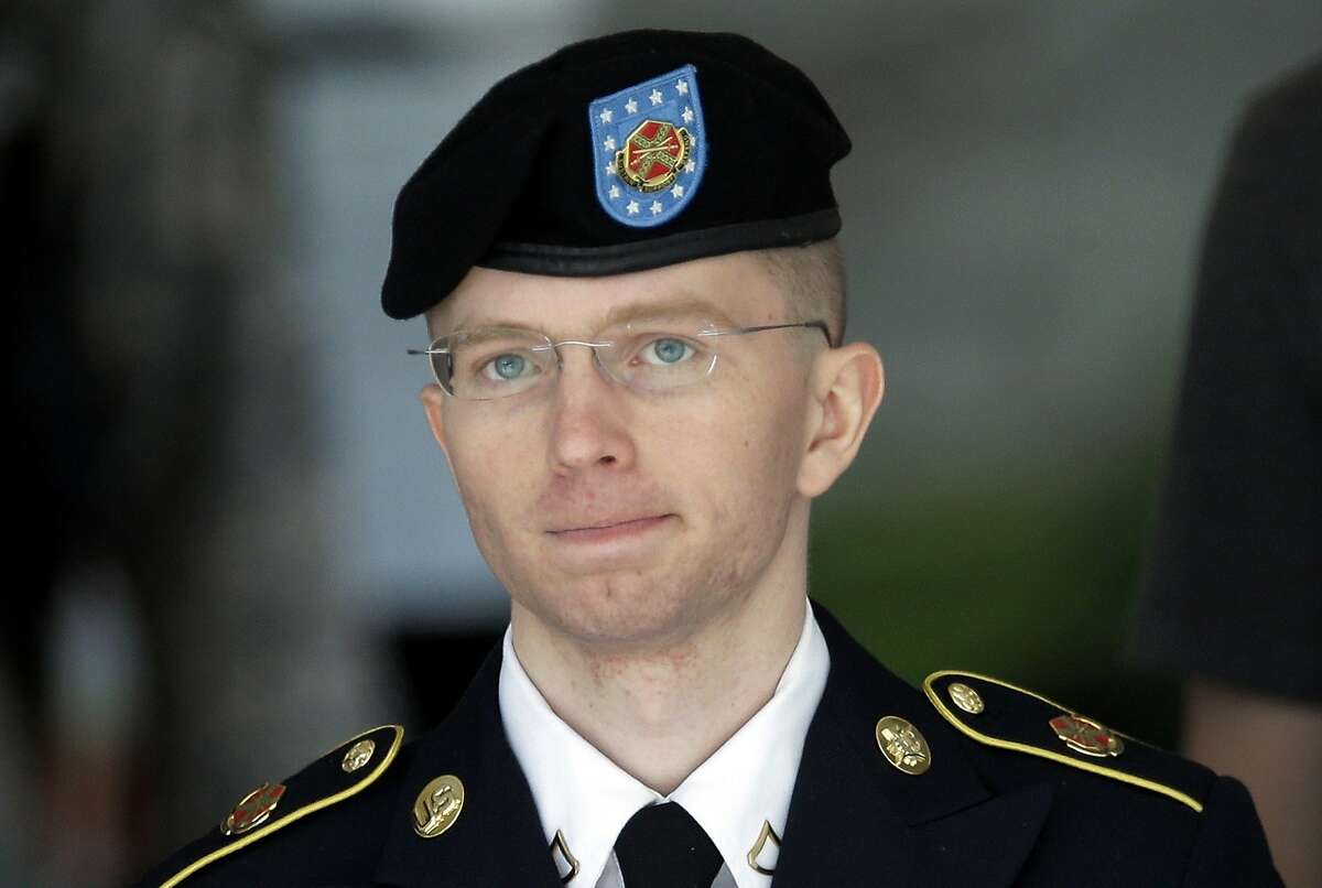 FILE - In this June 5, 2013, file photo Army Pvt. Chelsea Manning, then-Army Pfc. Bradley Manning, is escorted out of a courthouse in Fort Meade, Md., after the third day of his court martial. The convicted national security leaker has been found guilty during a hearing Tuesday, Aug. 18, 2015, that was closed to the public, of violating prison rules and will receive three weeks of recreational restrictions at the Kansas military prison where she's serving a 35-year sentence.