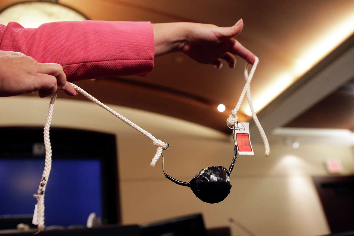 A gag used on the mouth of one of the victims is shown during a break as Bo Jett Littleton listens to closing arguments in his sentencing on kidnapping charges on August 19, 2015.