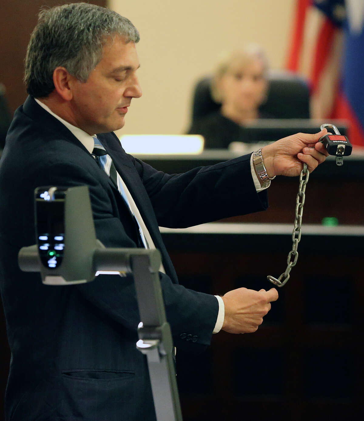 Prosecutor Chris DeMartino displays some of the evidence as Bo Jett Littleton listens to closing arguments in his sentencing on kidnapping charges on August 19, 2015.