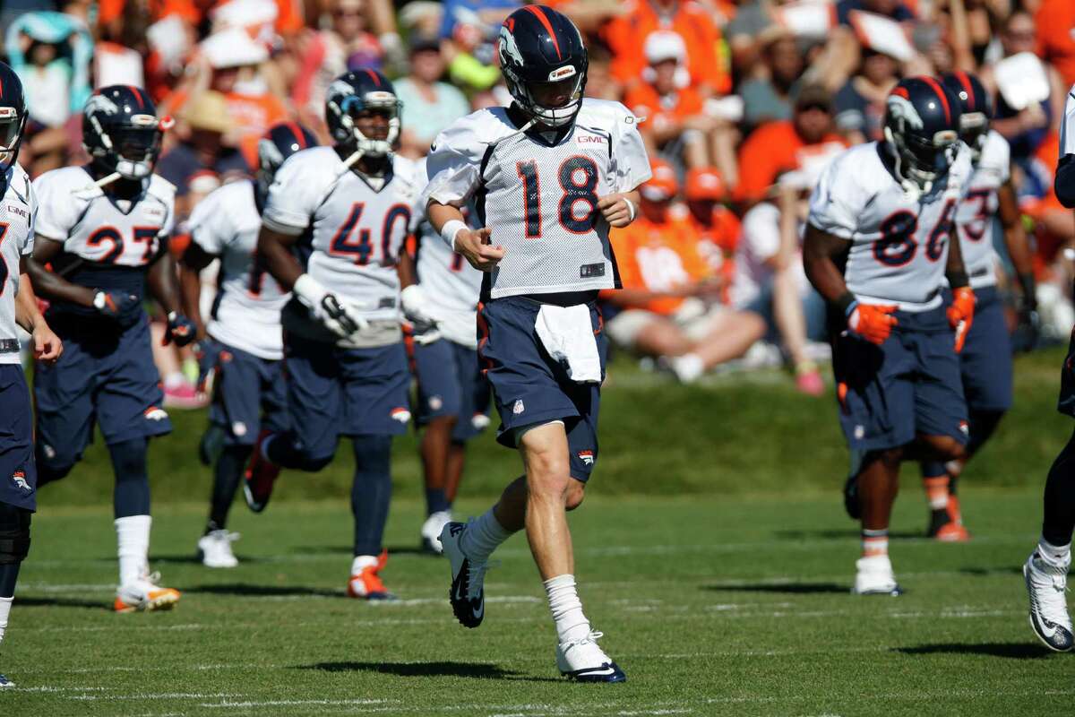 Denver Broncos quarterback Peyton Manning (18) during the morning session at the team's NFL training camp Wednesday, Aug. 12, 2015, in Englewood, Colo. (AP Photo/David Zalubowski)