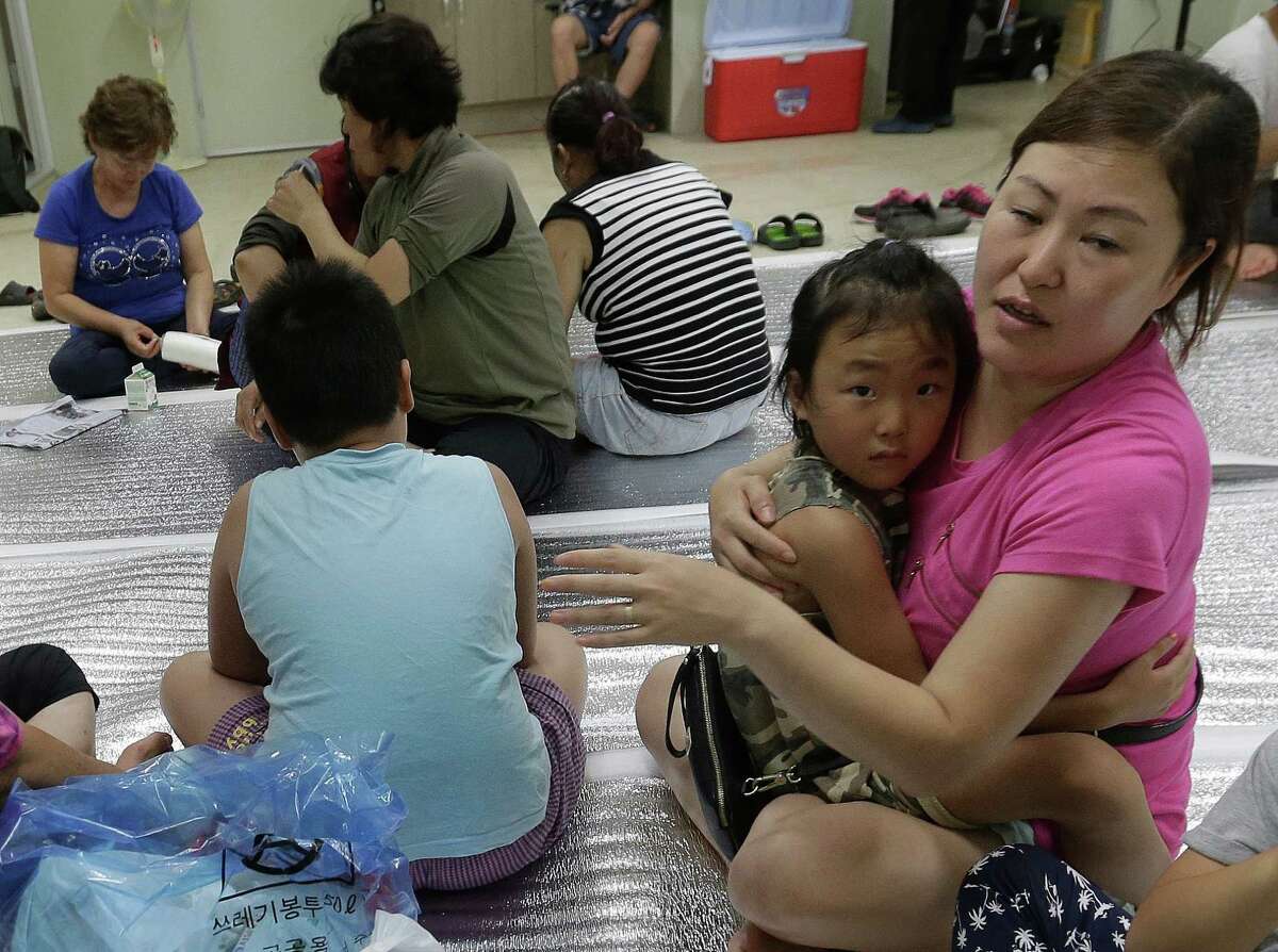 South Korean residents of Yeoncheon take shelter after ﻿North Korea lobbed a single artillery round at the border town, the South's Defense ministry said.