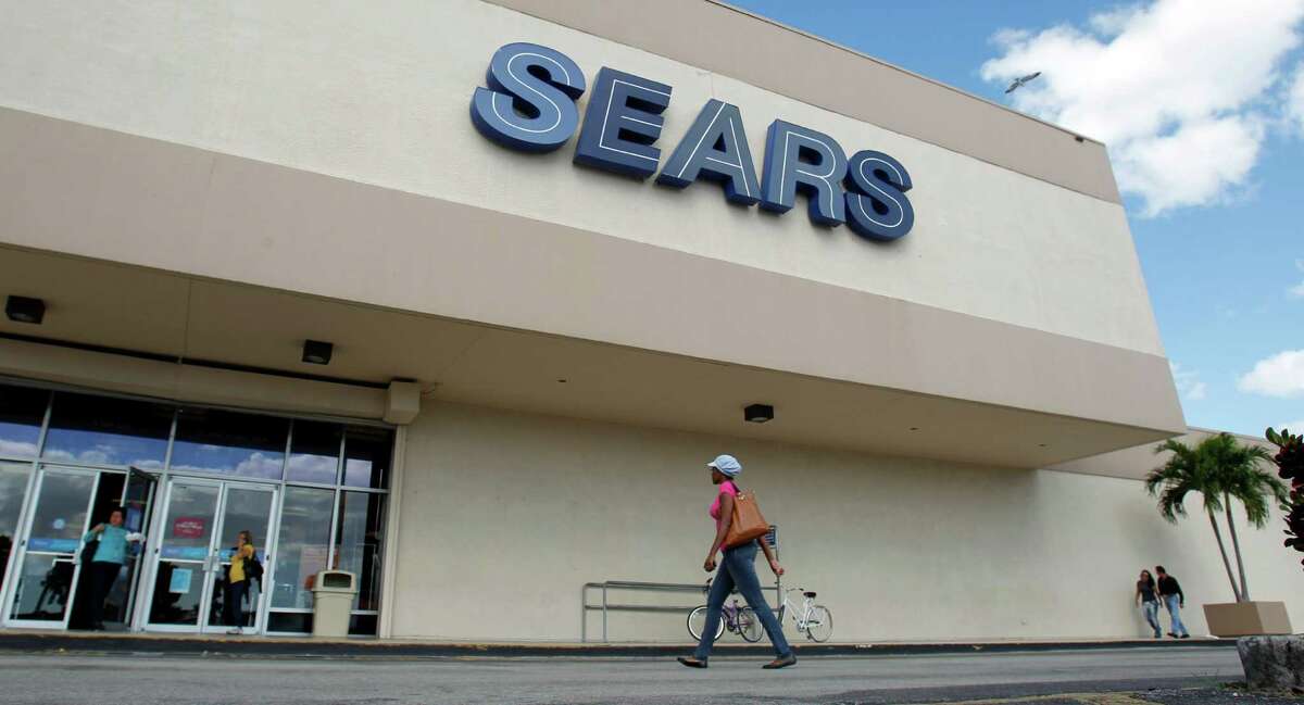 Sears reported its first quarterly profit in three years, bolstered by selling and leasing back some of its buildings to a new real estate investment trust.
