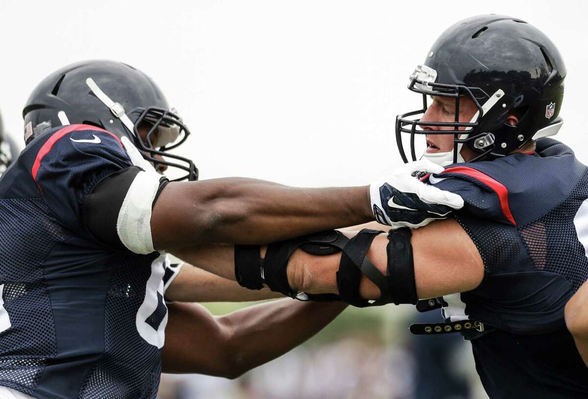 If he never gets another shot in the NFL, Jasper Coleman, left, can always say he once mixed it up with J.J. Watt in training camp.