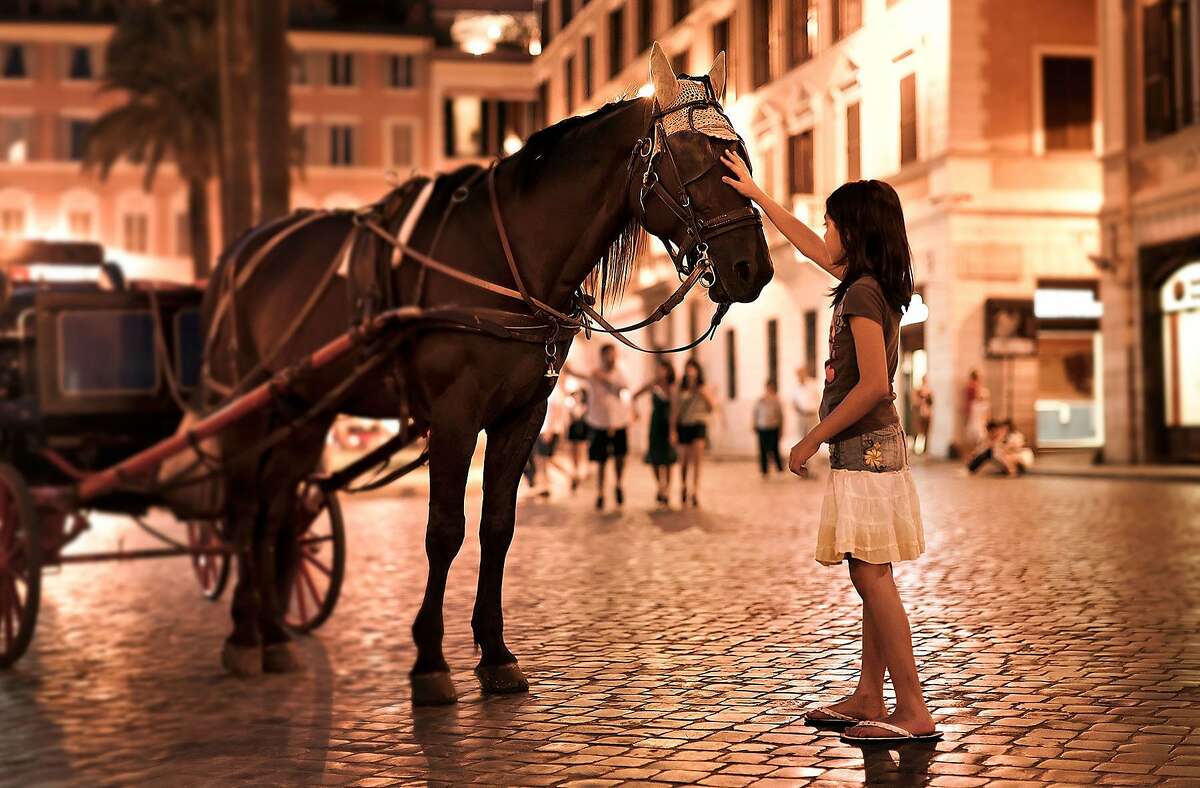There's magic afoot when you sightsee at night in Rome, as this young girl discovers near the Spanish Steps. az110708rm-1625.jpg