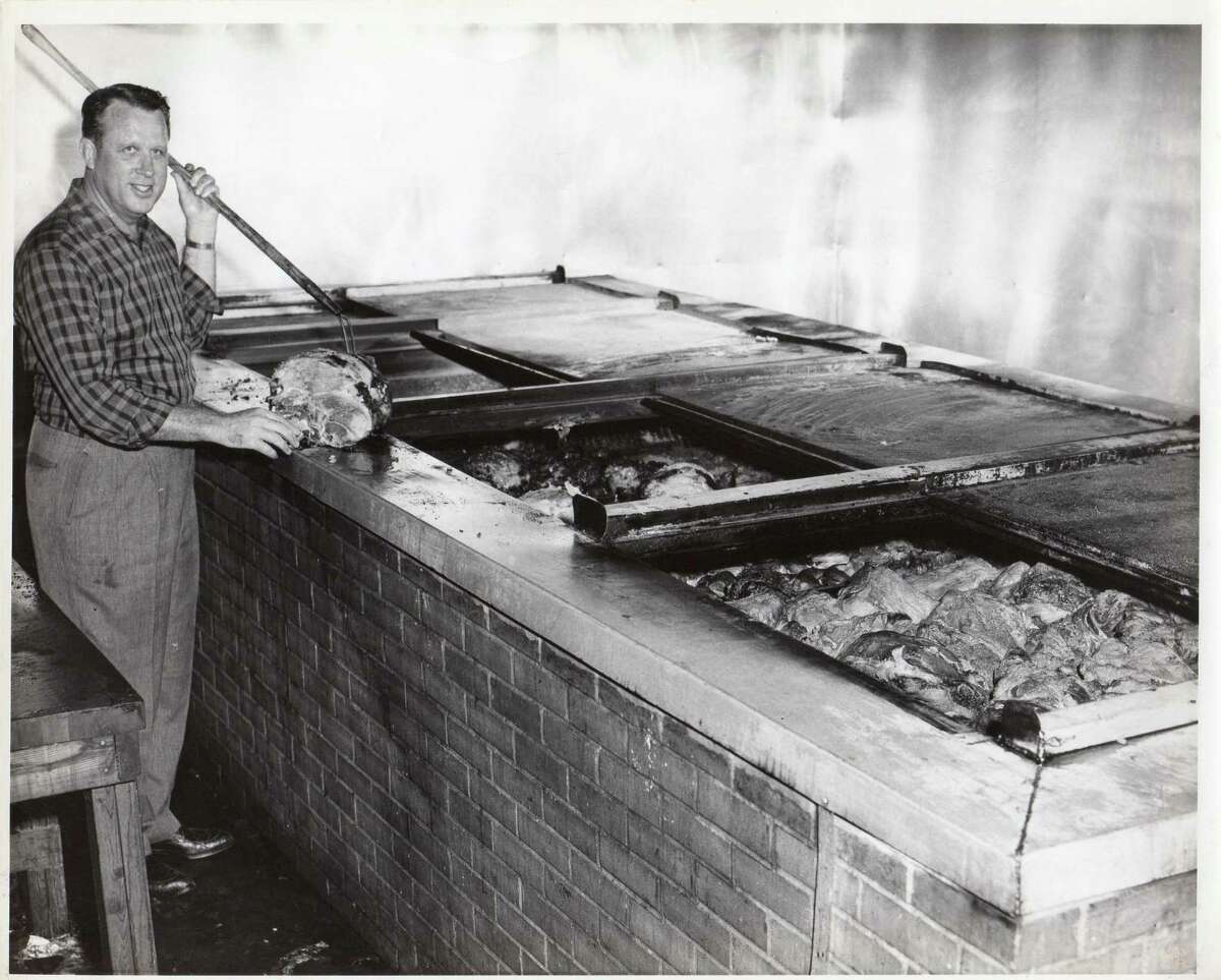Leonard McNeill at pits at 5420 Harrisburg location circa 1960.