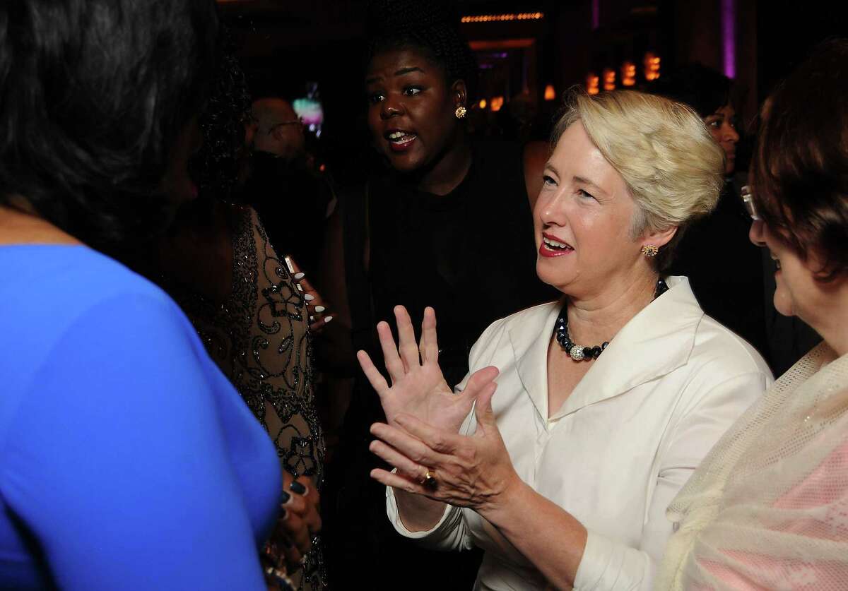 Mayor Annise Parker speaks with guests﻿.