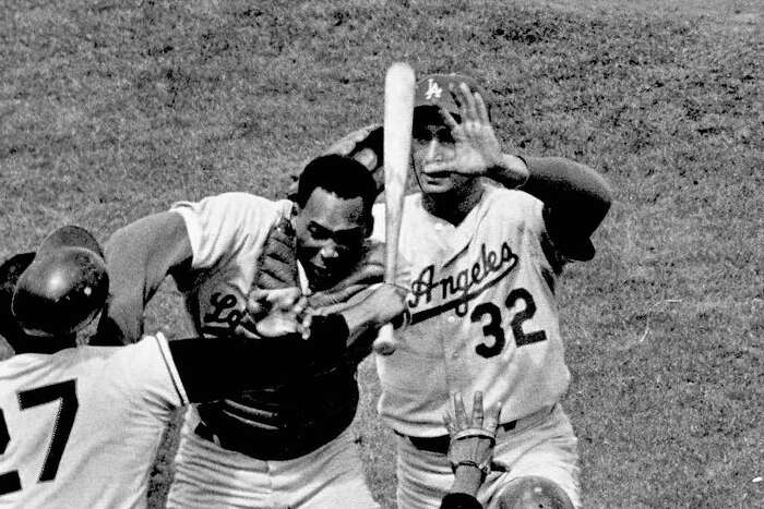 FILE - In this March 1951 file photo, Larry Jansen, New York Giant  right-handed pitcher is shown in St. Petersburgh, Fla. Jansen, the winning  pitcher for the New York Giants in the