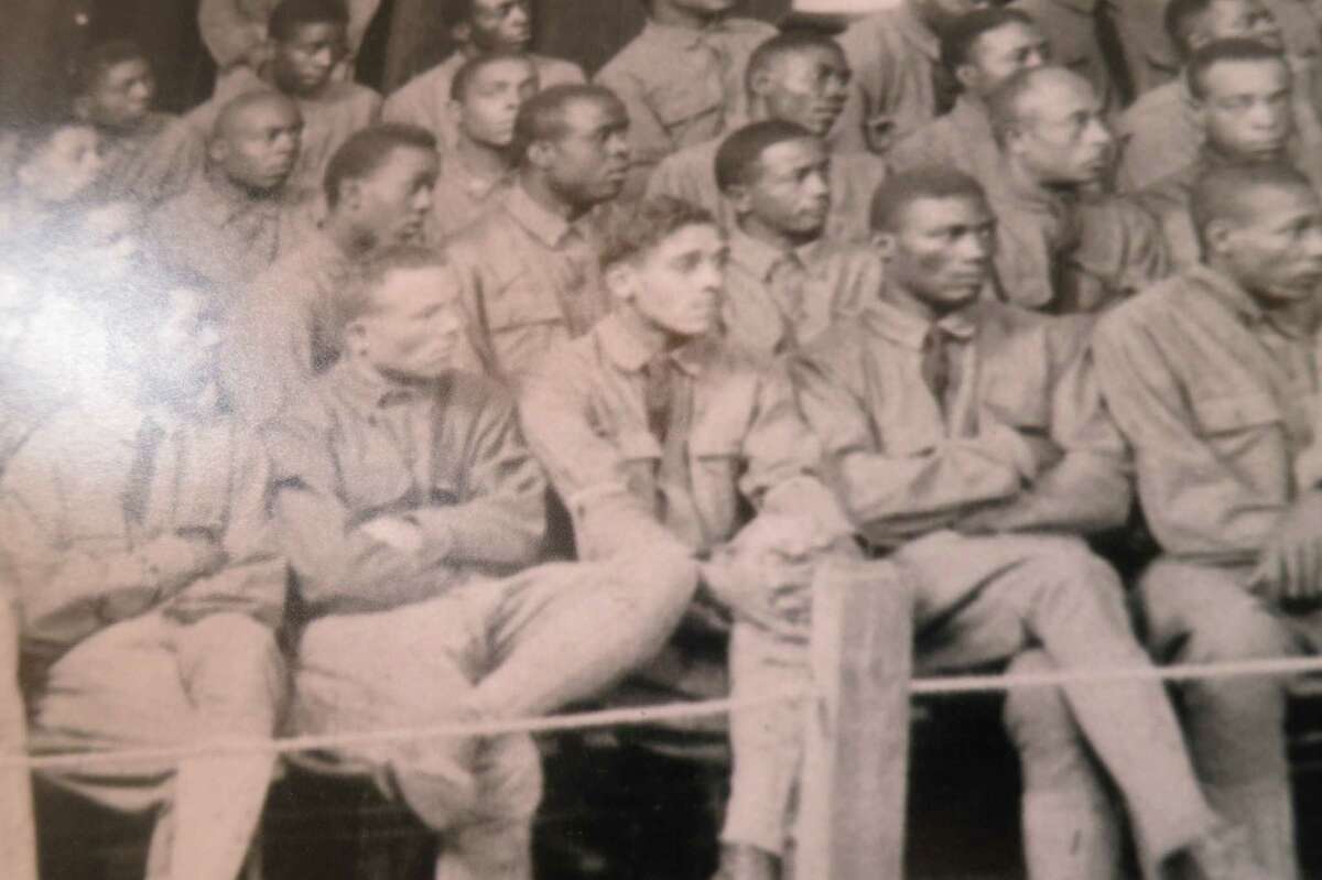 Jesse Moore, middle, first row, listens to testimony that will lead to his execution during the largest court-martial in American military history. A single inexperienced attorney was assigned to defend 63 soldiers.