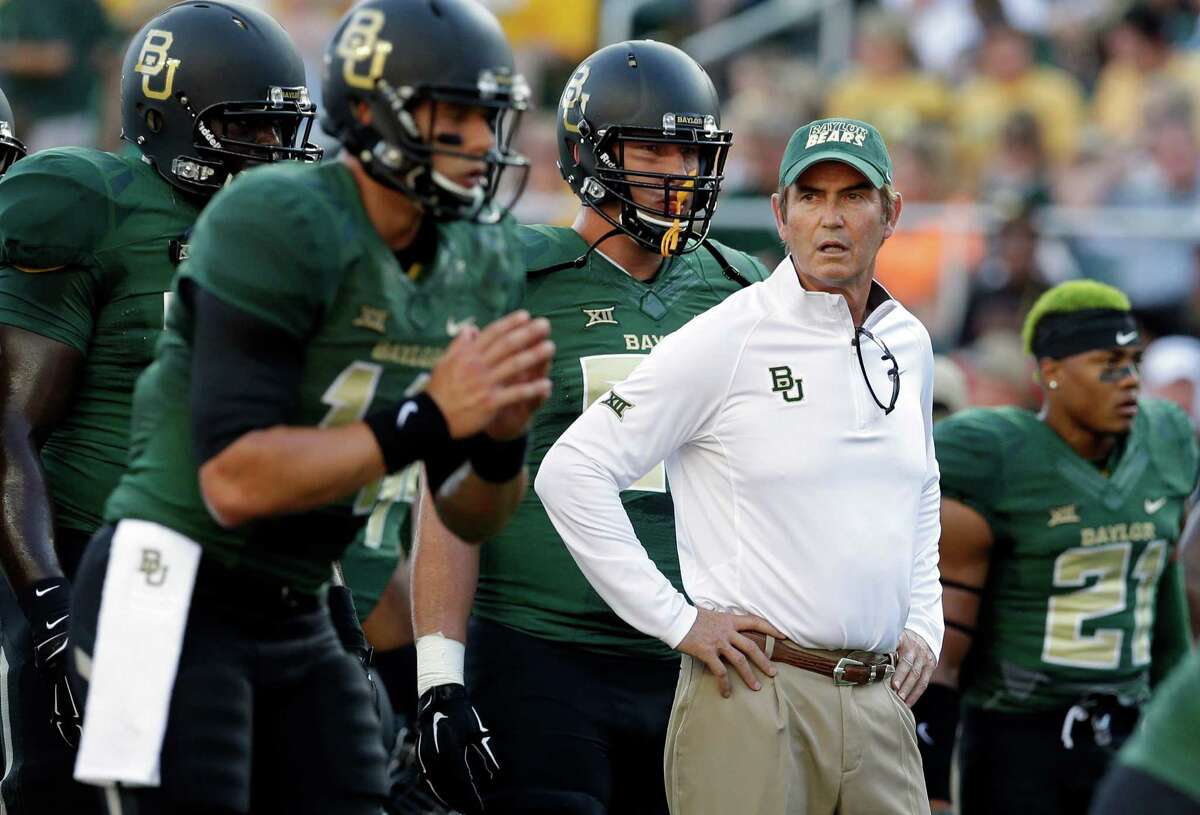 In this Aug. 31, 2014, file photo, Baylor head coach Art Briles watches his team warm up before a game against SMU in Waco.