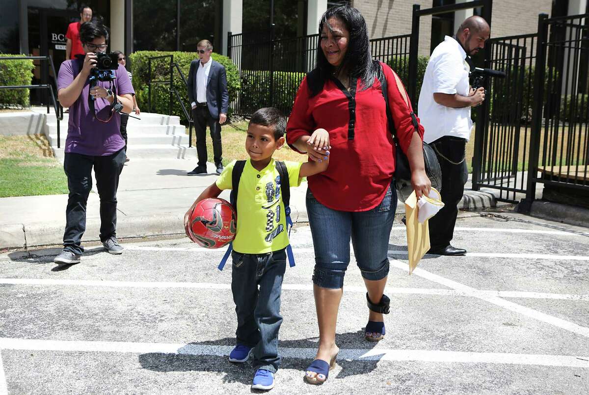 Wendy Rodriguez Vargas, center right, 38, of Honduras, walks with her 5 year old son Keverson, with members of RAICES, after the two were reunited at the BCFS office. Keverson was placed in foster care after being picked up with his father in June, after crossing the border into Eagle Pass. Wendy and her 2 year-old daughter Alexia crossed into Eagle Pass separate from her husband and were taken to the detention center in Dilley. Her husband Juan Carlos Irias Archaga, is still in a detention center in Del Rio. Wendy and the two children will be traveling to Atlanta to join family members who live there.
