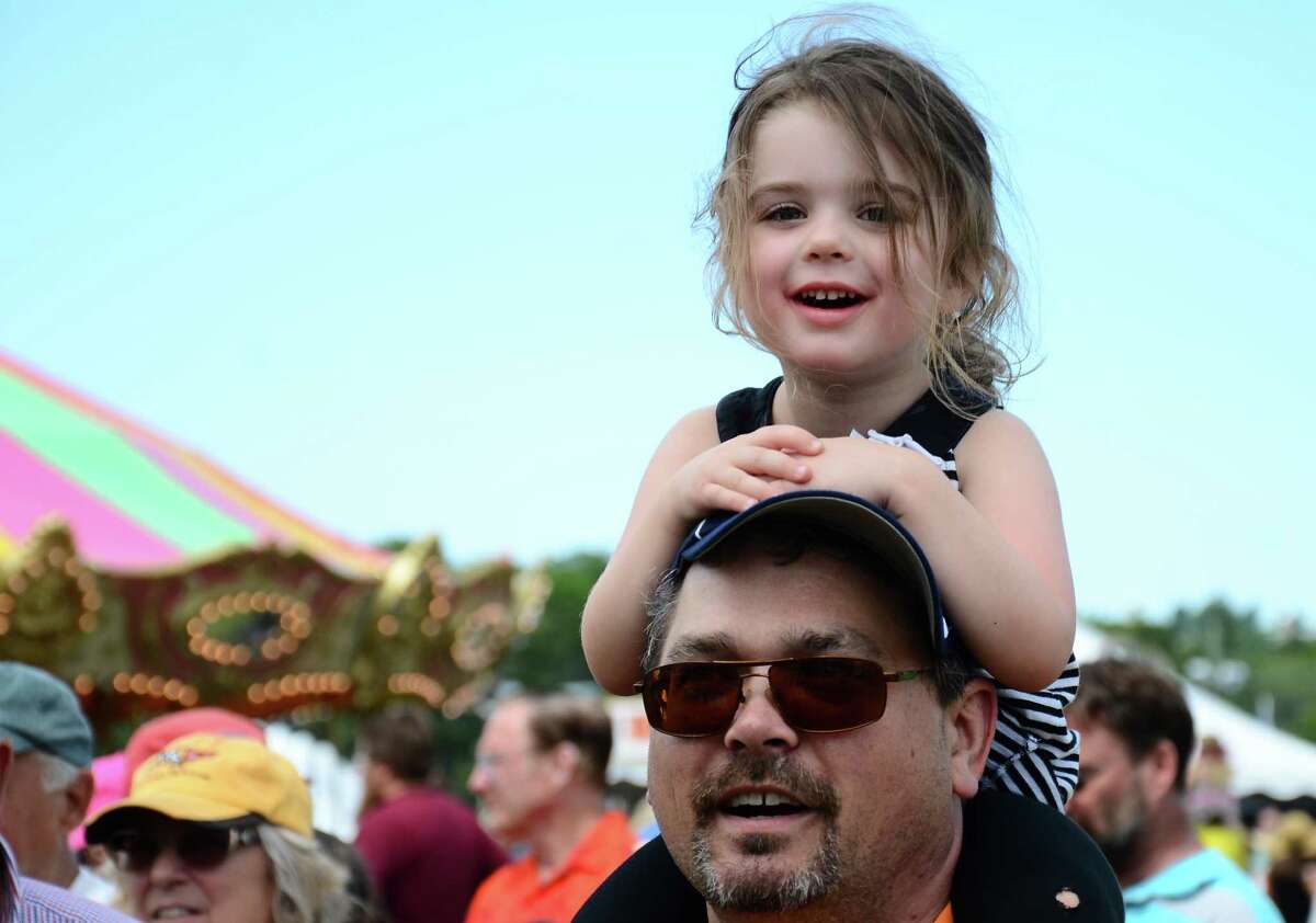 Millie Buchheit and her father, Brett, of Denver, Colo., stopped by the 64th annual Bridgewater Country Fair Saturday, Aug. 22, 2015, during a visit to Connecticut.