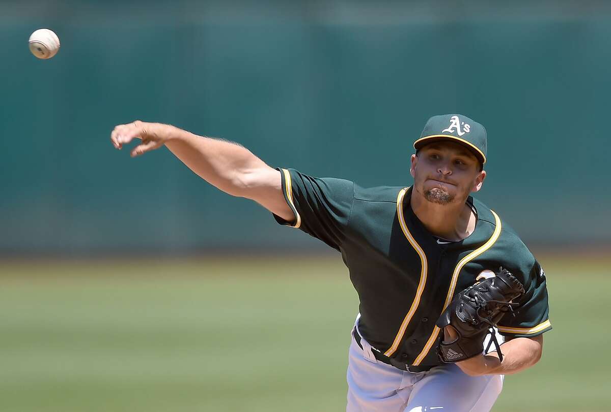OAKLAND, CA - AUGUST 23: Kendall Graveman #31 of the Oakland Athletics pitches against the Tampa Bay Rays in the top of the first inning at O.co Coliseum on August 23, 2015 in Oakland, California. (Photo by Thearon W. Henderson/Getty Images)