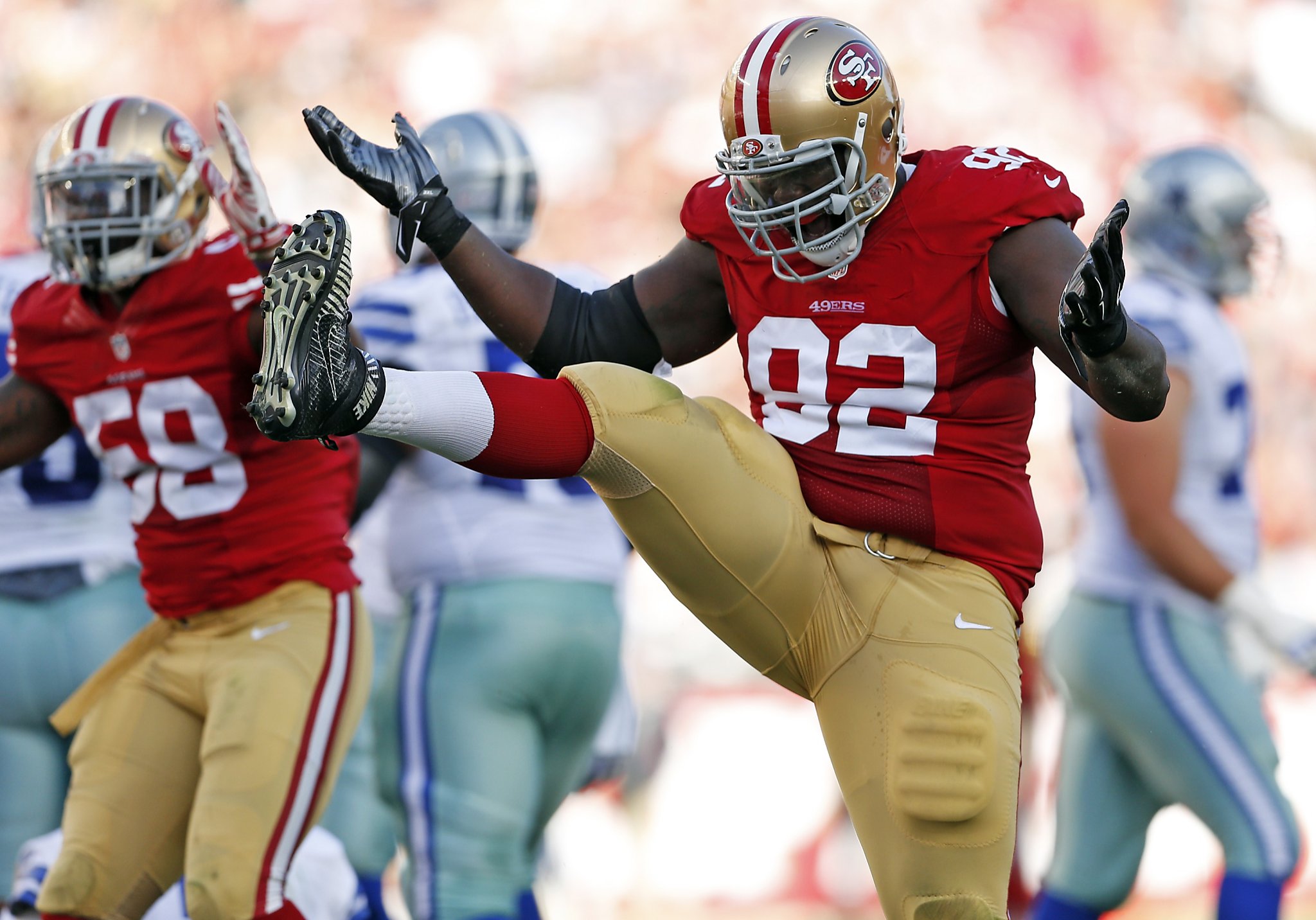 49ers defensive back L.J. McCray tries to prevent a punt from