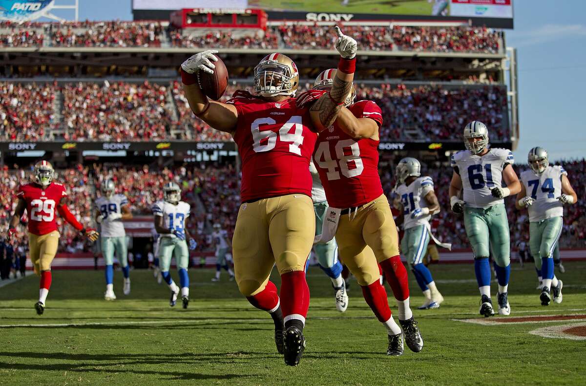 SANTA CLARA, CA - AUGUST 23: Nose tackle Mike Purcell #64 of the San Francisco 49ers returns an interception for a 47-yard touchdown against the Dallas Cowboys in the second quarter during a preseason game on August 23, 2015 at Levi's Stadium in Santa Clara, California. (Photo by Brian Bahr/Getty Images)