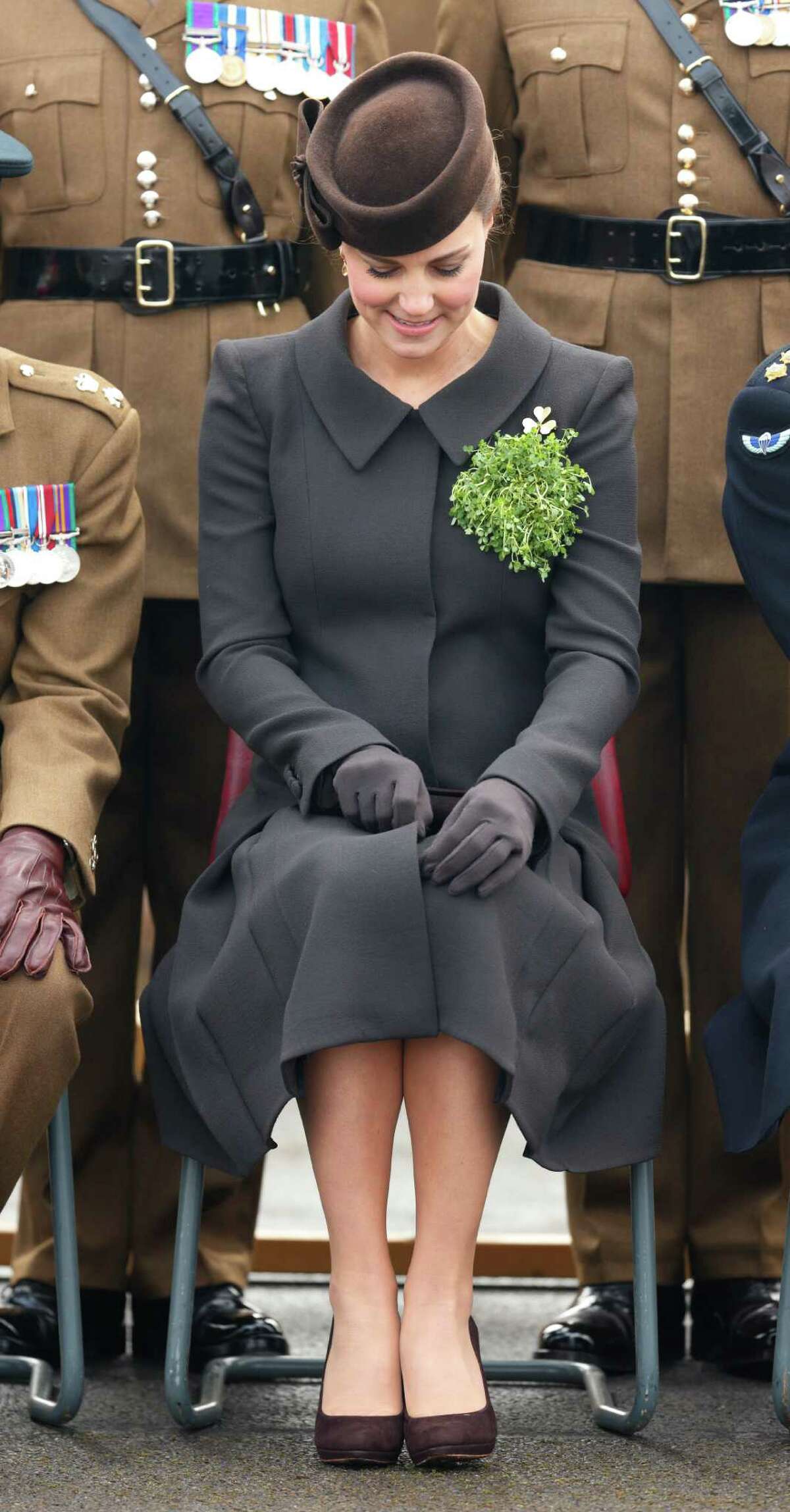 Catherine, Duchess of Cambridge poses for a regimental photograph as she attends the annual St Patrick's Day Parade at Mons Barracks on March 17, 2015 in Aldershot, England.
