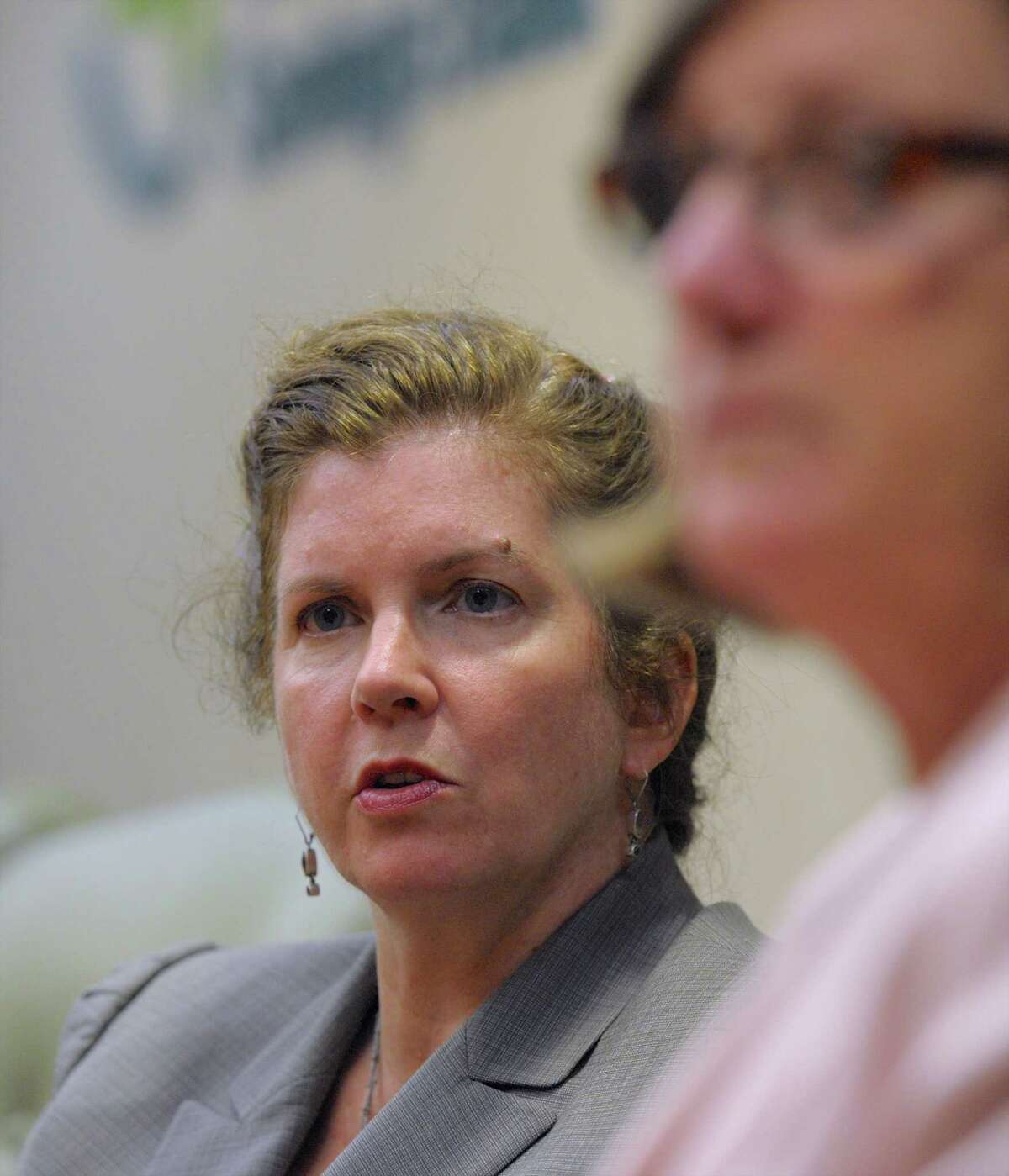 Marie O'Neill, Chief Branding & Innovation Officer, left, and Cynthia Merkle, right, President & CEO of Union Savings Bank, talk about the bank's new innovation center on Thursday, August 13, 2015, in Danbury, Conn.