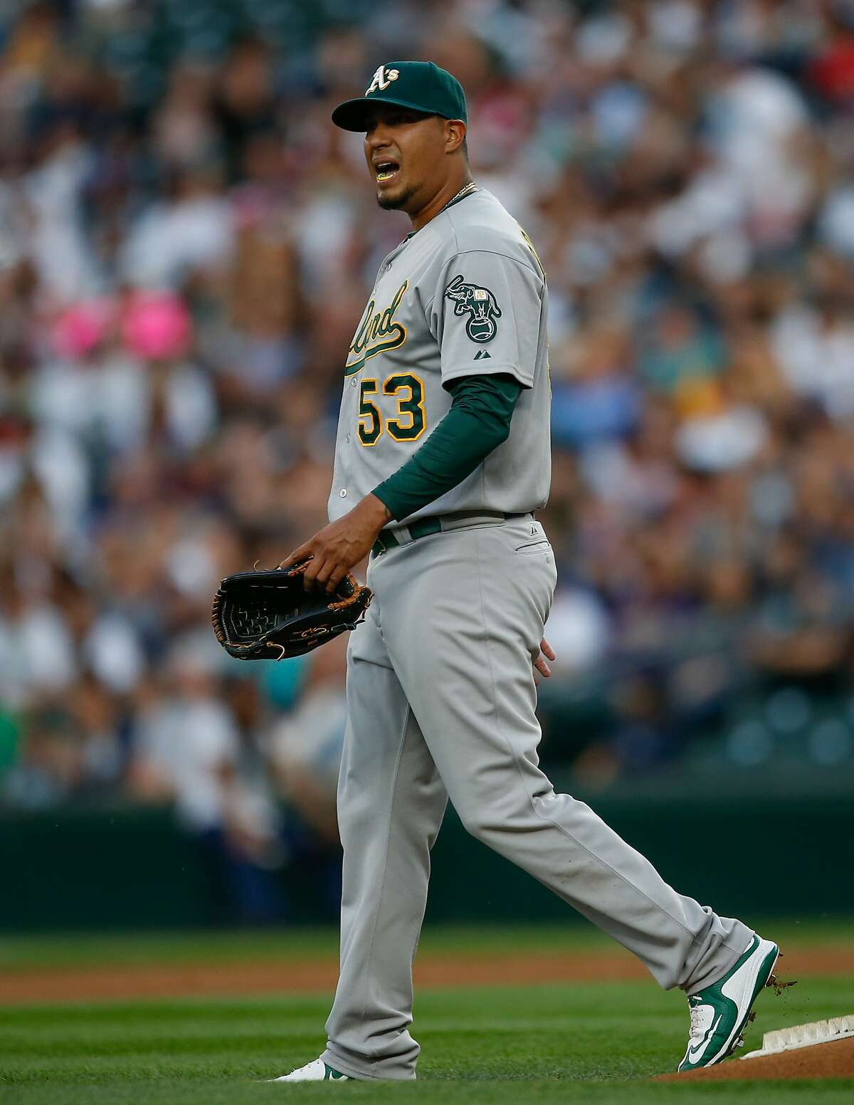 SEATTLE, WA - AUGUST 24: Starting pitcher Felix Doubront #53 of the Oakland Athletics walks off the mound after taking a batted ball off of his ankle in the first inning against the Seattle Mariners at Safeco Field on August 24, 2015 in Seattle, Washington. (Photo by Otto Greule Jr/Getty Images)
