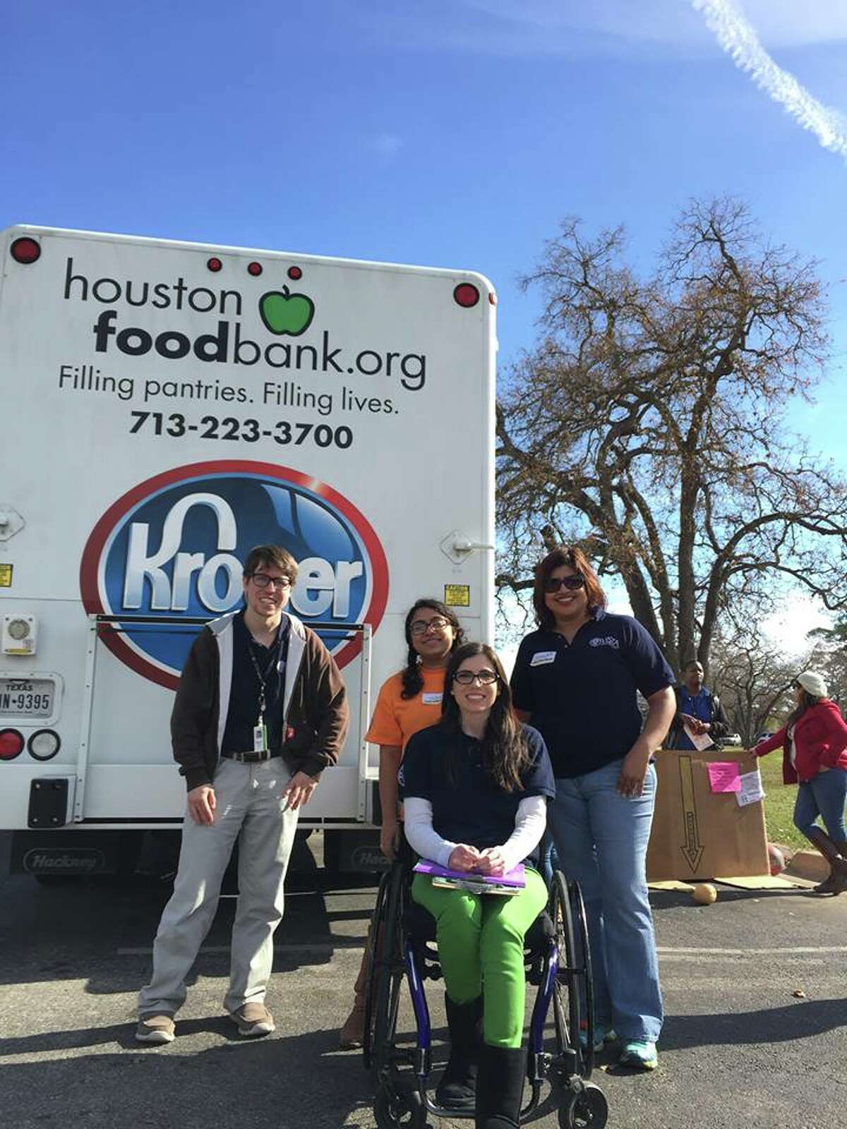 Spencer Brown, left, spent the past year working at the Houston Food Bank through the Americorps VISTA program.