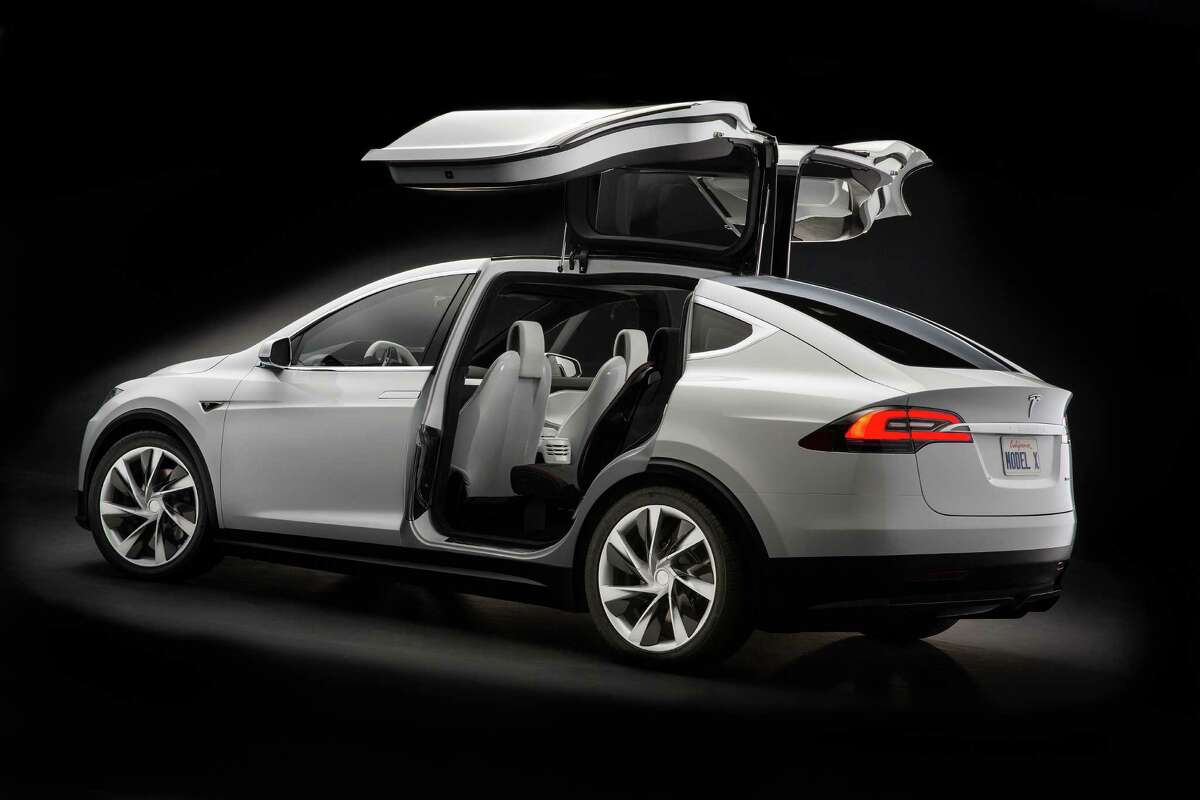 Tesla reveals new photos, new details of Model X SUV