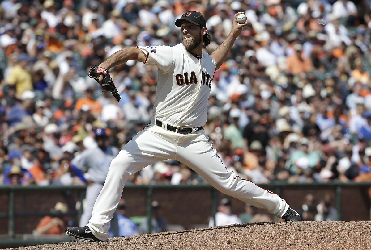 San Francisco Giants pitcher Madison Bumgarner throws against the Chicago Cubs during the sixth inning of a baseball game in San Francisco, Thursday, Aug. 27, 2015. (AP Photo/Jeff Chiu)