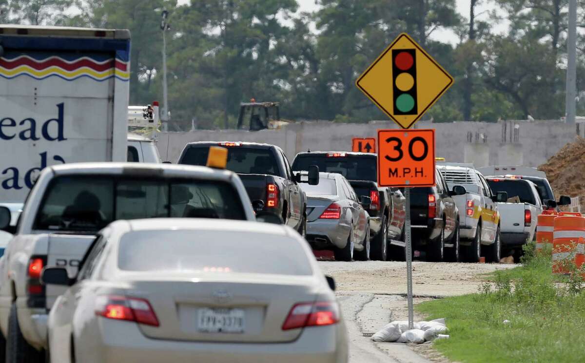 Traffic lines up along Riley Fuzzel near the insection of Rayford where the Grand Parkway is under construction shown Thursday, Aug. 27, 2015, in Spring. ( Melissa Phillip / Houston Chronicle )