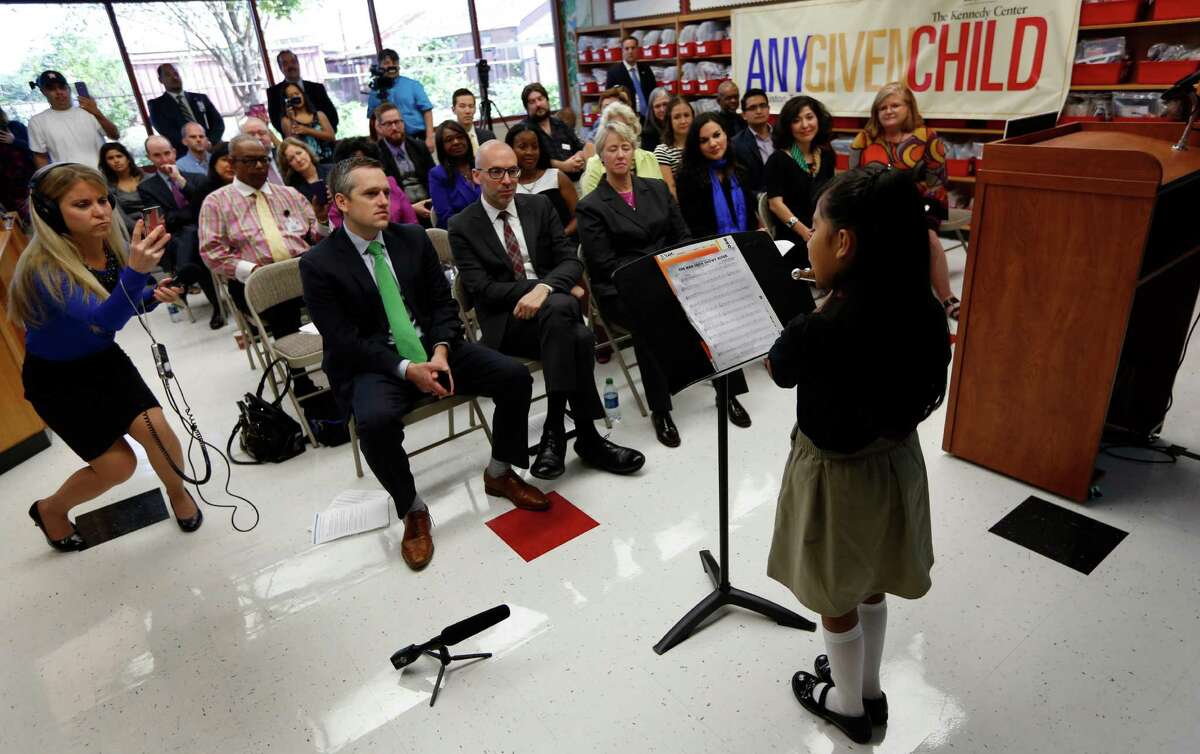 Whittier Elementary School 4th grader Marifer Lopez plays her flute solo Thursday, Aug. 27, 2015, in Houston. Lopez performed during a press conference announcing partnership between Washington's Kennedy Center, HISD and City of Houston in national arts education program. Houston is 19th city selected to join the program.