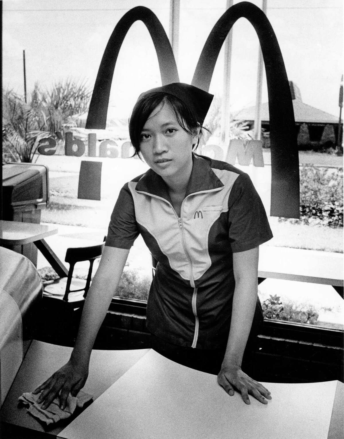 08/16/1975 - Tran Dam, 18, just started her job selling hamburgers at a southwest Houston McDonald's. She and her family came to Houston in July 1975.
