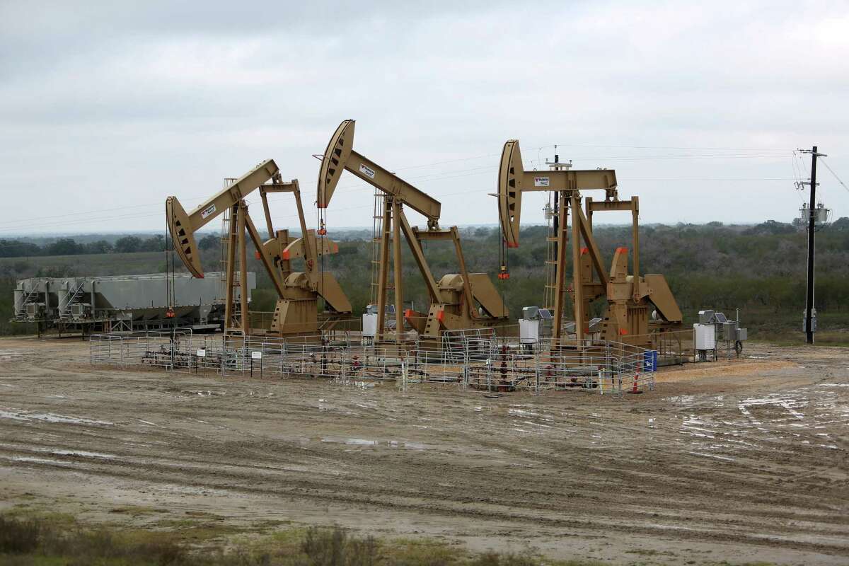 Wells like these in Texas' Eagle Ford shale typically produce a lighter grade crude that may be suitable for shipment to overseas refineries under a congressional budget deal that would lift a 40-year-old ban on U.S. oil exports. (Houston Chronicle photo)