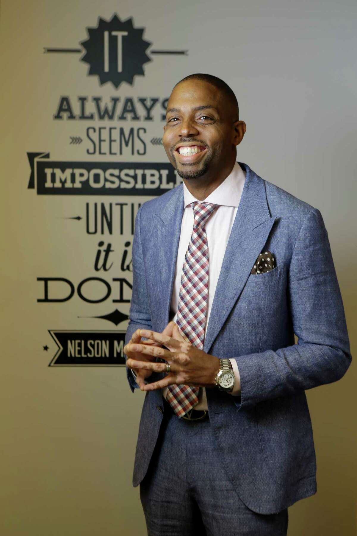 Jerome Love, founder of the Texas Black Expo, credits a friend with helping him upgrade his suits.