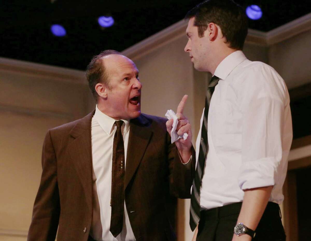 Craig Griffin performs as Juror 10 with Jason Bergstrom performing as Juror 12 during a scene from "12 Angry Men," performed at A. D. Players, Wednesday, Aug. 26, 2015, in Houston. ( Jon Shapley / Houston Chronicle )