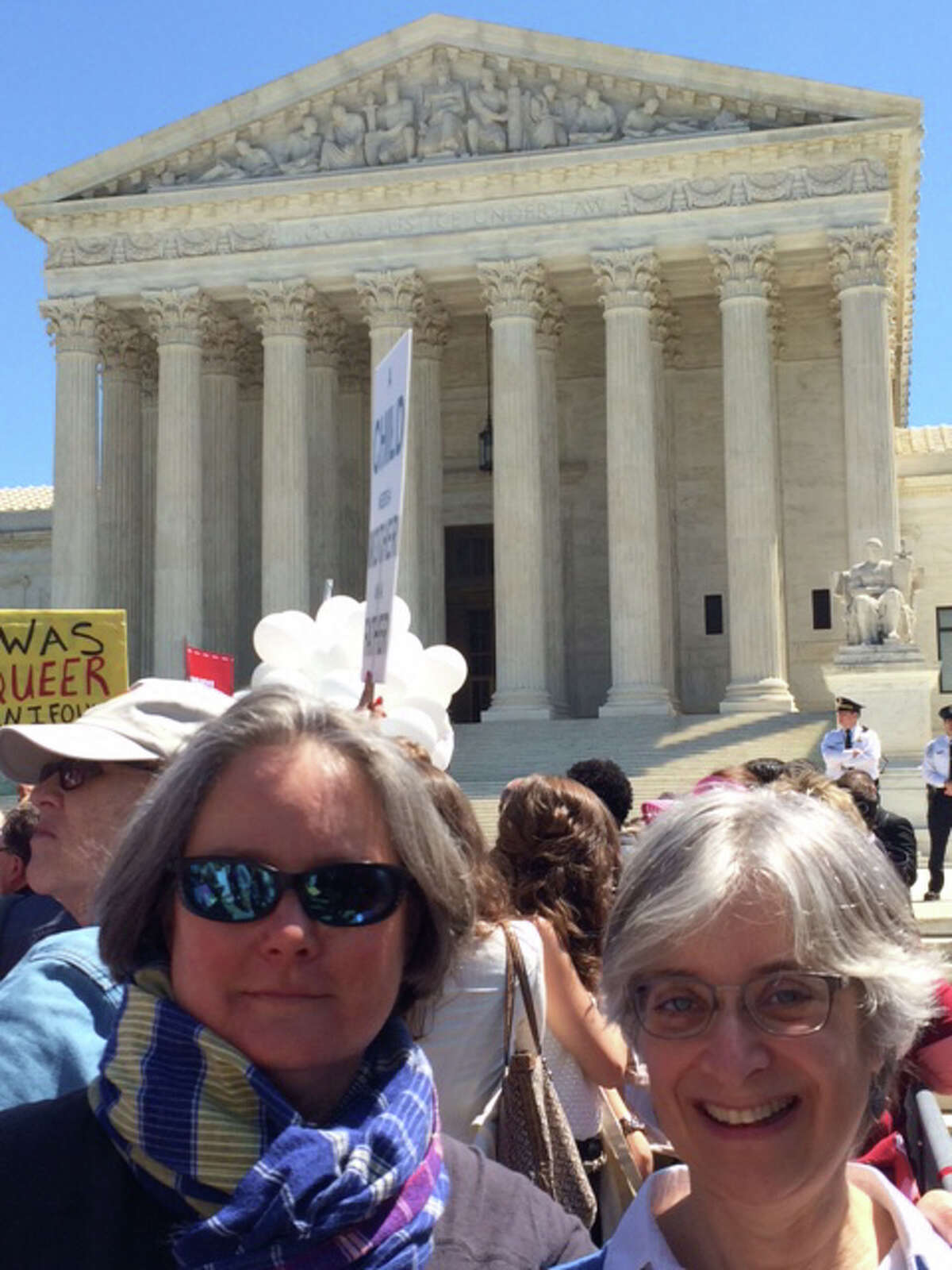 The girlfriend (on the left) and me, in front of the Supreme Court protesters.