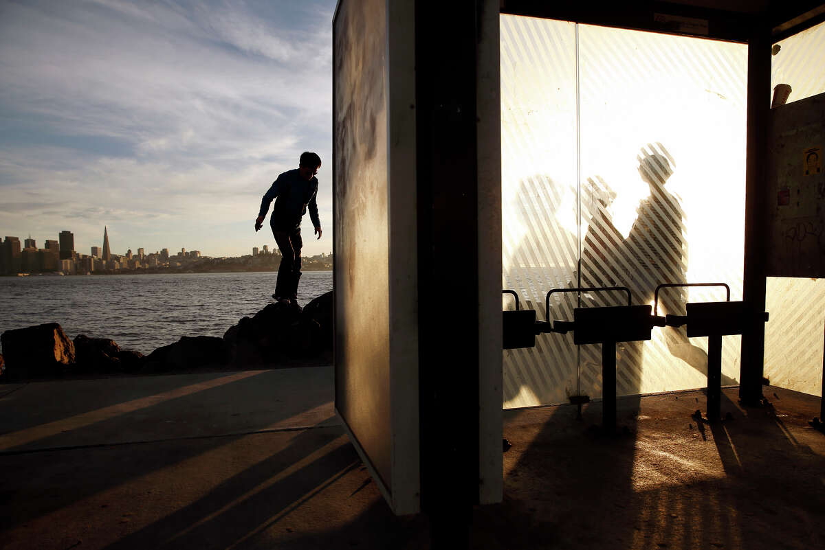 Tourists visit Treasure Island, where San Francisco officials hope an arts scene will help revitalize the island.