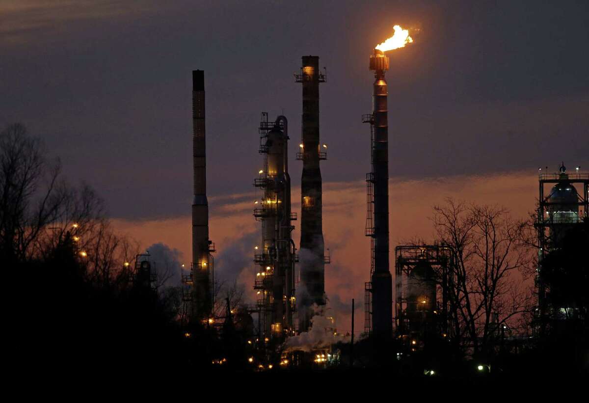 Stacks from the Exxon Mobil refinery are seen in St. Bernard Parish, La. The profit margin for the 108-member MSCI World Energy Sector Index, which includes Exxon Mobil Corp. and Chevron Corp., is the lowest since at least 1995, the earliest for when data is available.