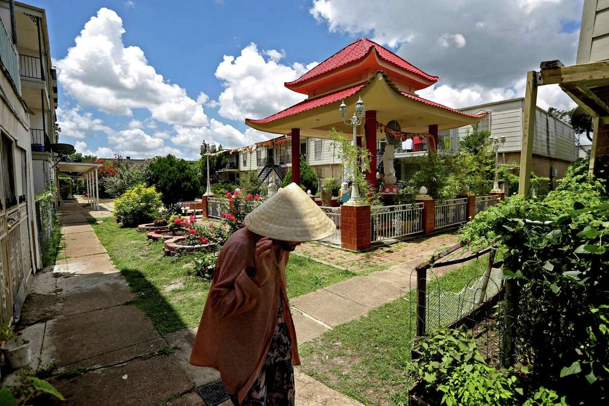 A Buddhist shrine stands out in the north courtyard at Thai Xuan Village on Broadway Street Houston. ﻿A Catholic priest and Vietnamese refugee ﻿ with community support purchased this complex in the 1980s, creating the Vietnamese village.﻿ Click through the gallery for more, including historic photos of Vietnamese citizens leaving after the fall of Saigon and Vietnamese refugees in Texas.