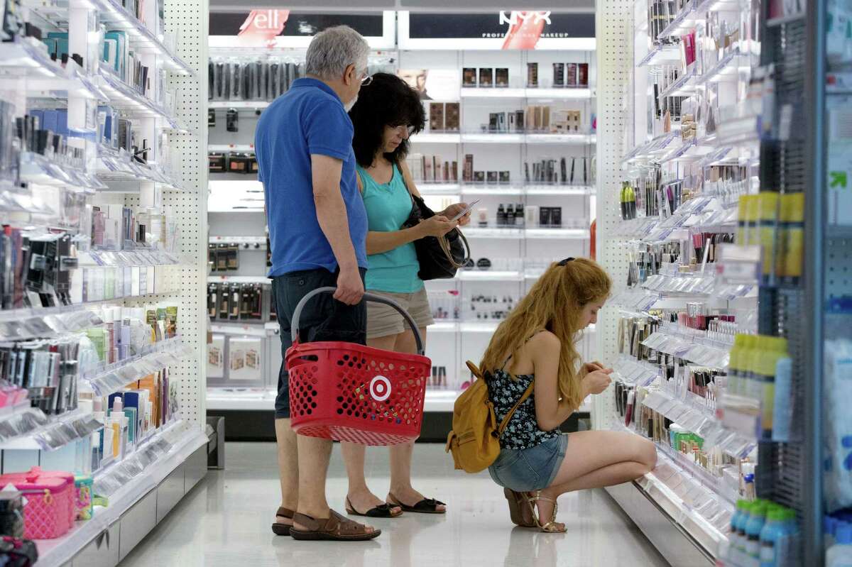 In this Aug. 21, 2015 photo, people shop at the CityTarget store in Boston. Plummeting stock prices have taken a toll on U.S. consumer confidence, though there are signs the setback may be temporary. The University of Michigan says its consumer sentiment index fell to 91.9 Aug. 2014 from 93.1 in July. The index is still up 11.4 percent from a year ago. (AP Photo/Michael Dwyer)
