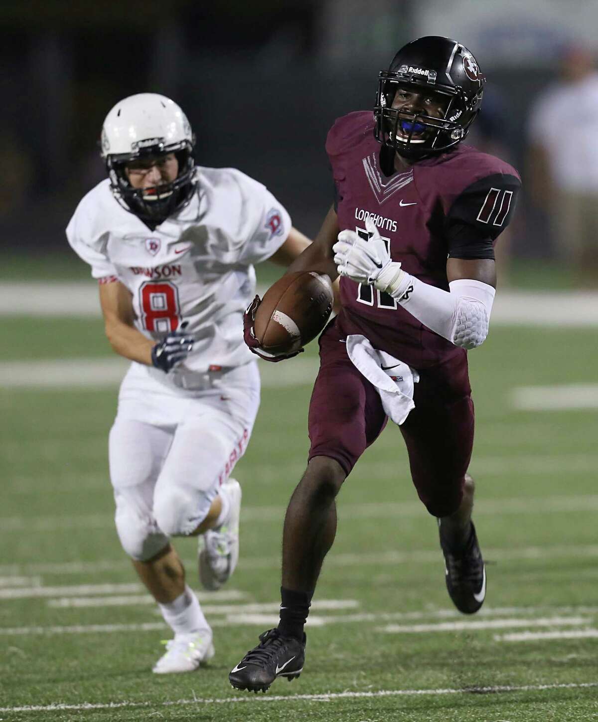 George Ranch defensive back Jairon McVea﻿ returns an interception 27 yards for a touchdown during the Longhorns' win over Dawson on Friday night.