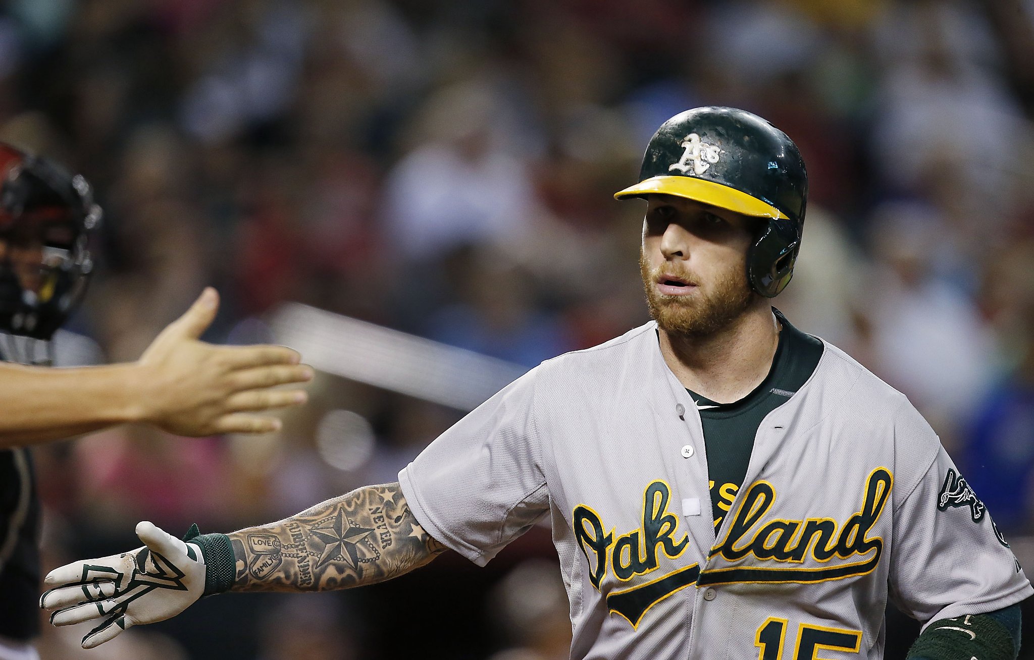 The tattooed right arm of Oakland Athletics Brett Lawrie during News  Photo - Getty Images