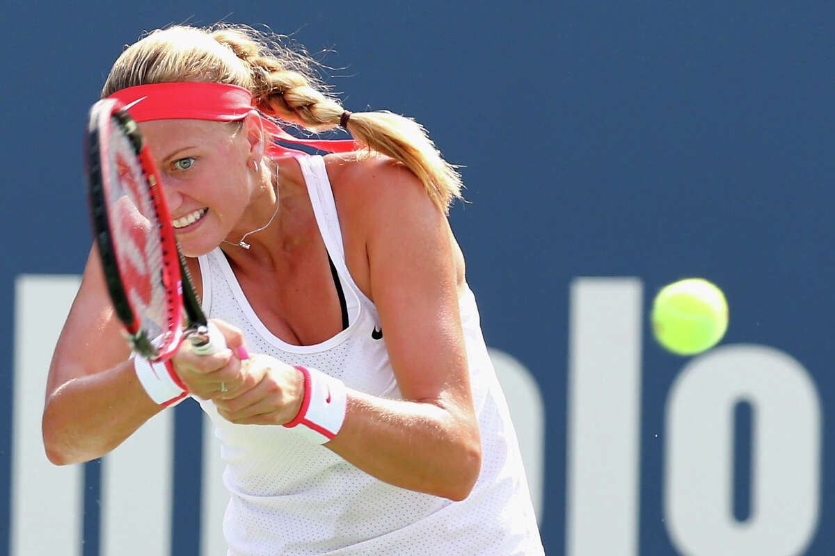 NEW HAVEN, CT - AUGUST 29: Petra Kvitova of Czech Republic returns a backhand to Lucie Safarova of Czech Republic during the final round on Day 6 of the Connecticut Open at Connecticut Tennis Center at Yale on August 29, 2015 in New Haven, Connecticut.