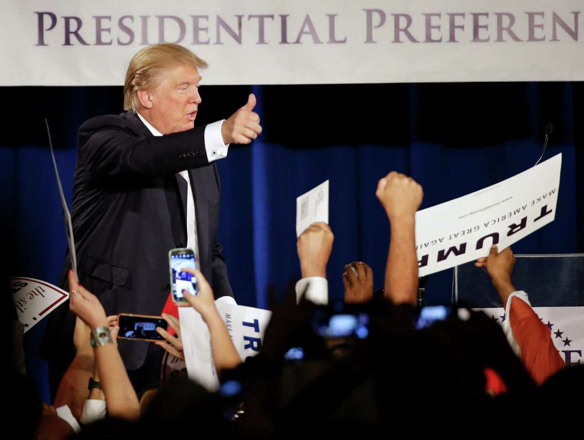 Republican presidential candidate Donald Trump acknowledges the crowd after speaking in Nashville, Tenn.
