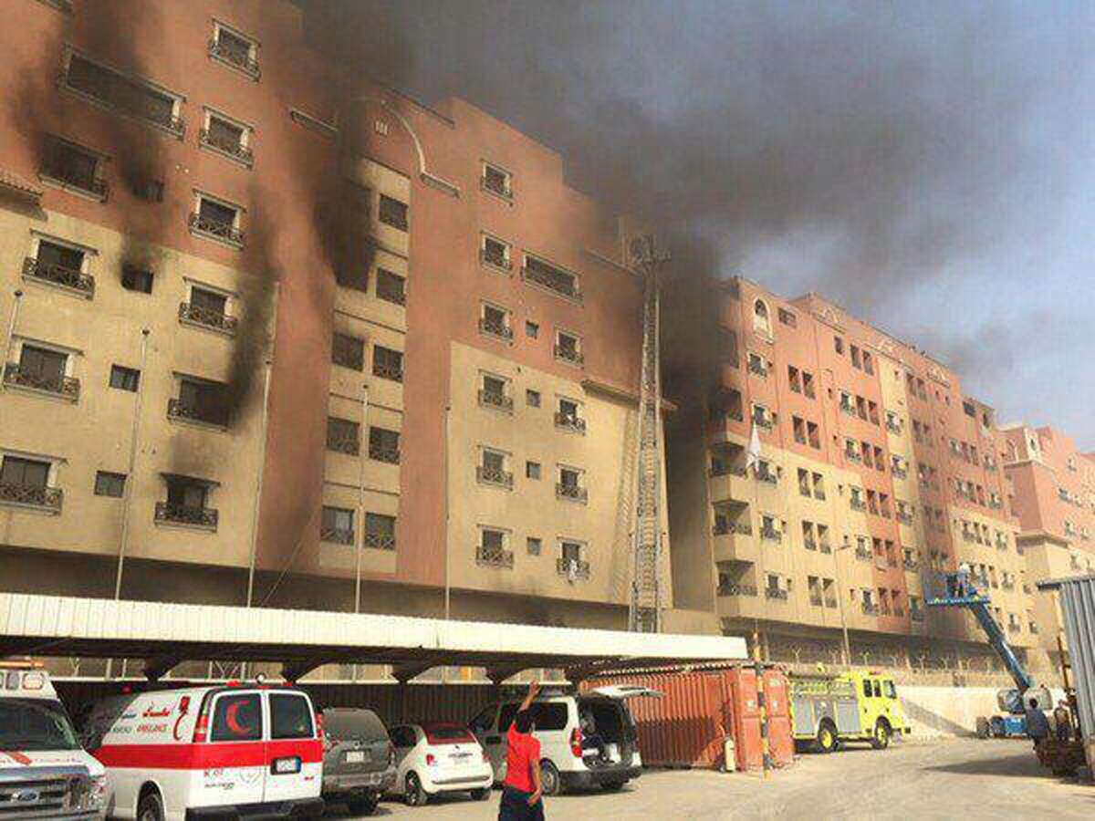 In this image released by the Saudi Interior Ministryâs General Directorate of Civil Defense, smoke billows from a residential complex in Khobar, Saudi Arabia, Sunday, Aug. 30, 2015. A fire broke out at the residential complex used by the state oil giant Saudi Aramco. (Saudi Interior Ministry General Directorate of Civil Defense via AP)