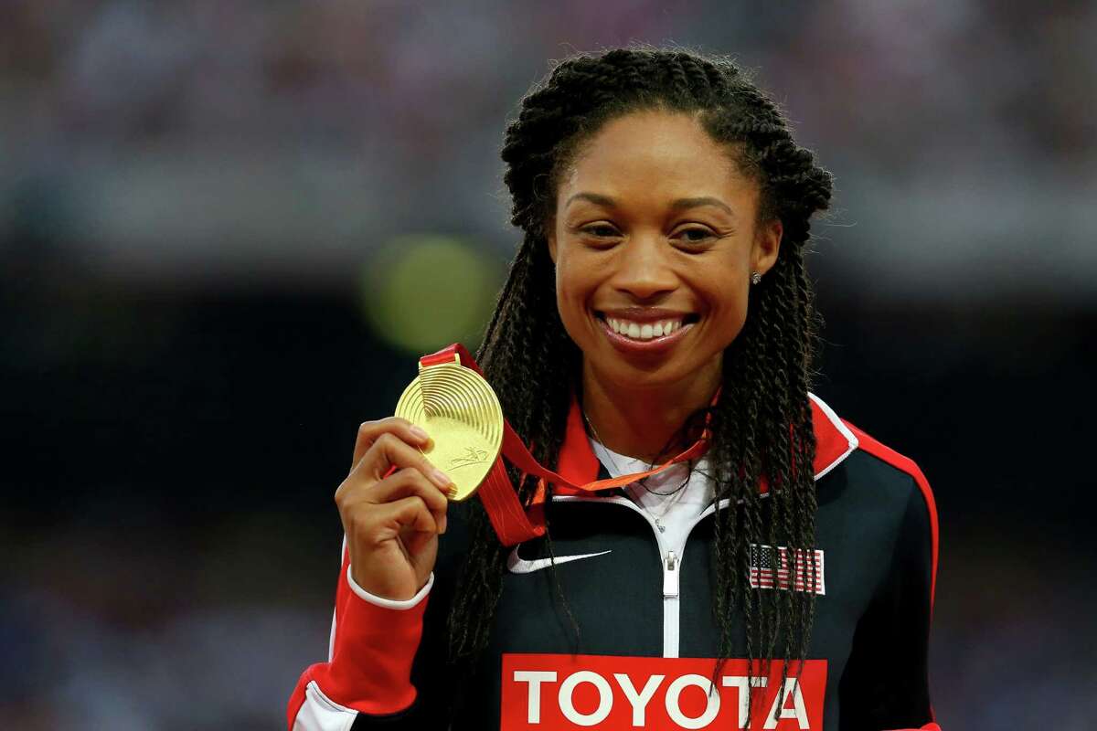 BEIJING, CHINA - AUGUST 28: Gold medalist Allyson Felix of the United States poses on the podium during the medal ceremony for the Women's 400 metres final during day seven of the 15th IAAF World Athletics Championships Beijing 2015 at Beijing National Stadium on August 28, 2015 in Beijing, China. (Photo by Alexander Hassenstein/Getty Images for IAAF)