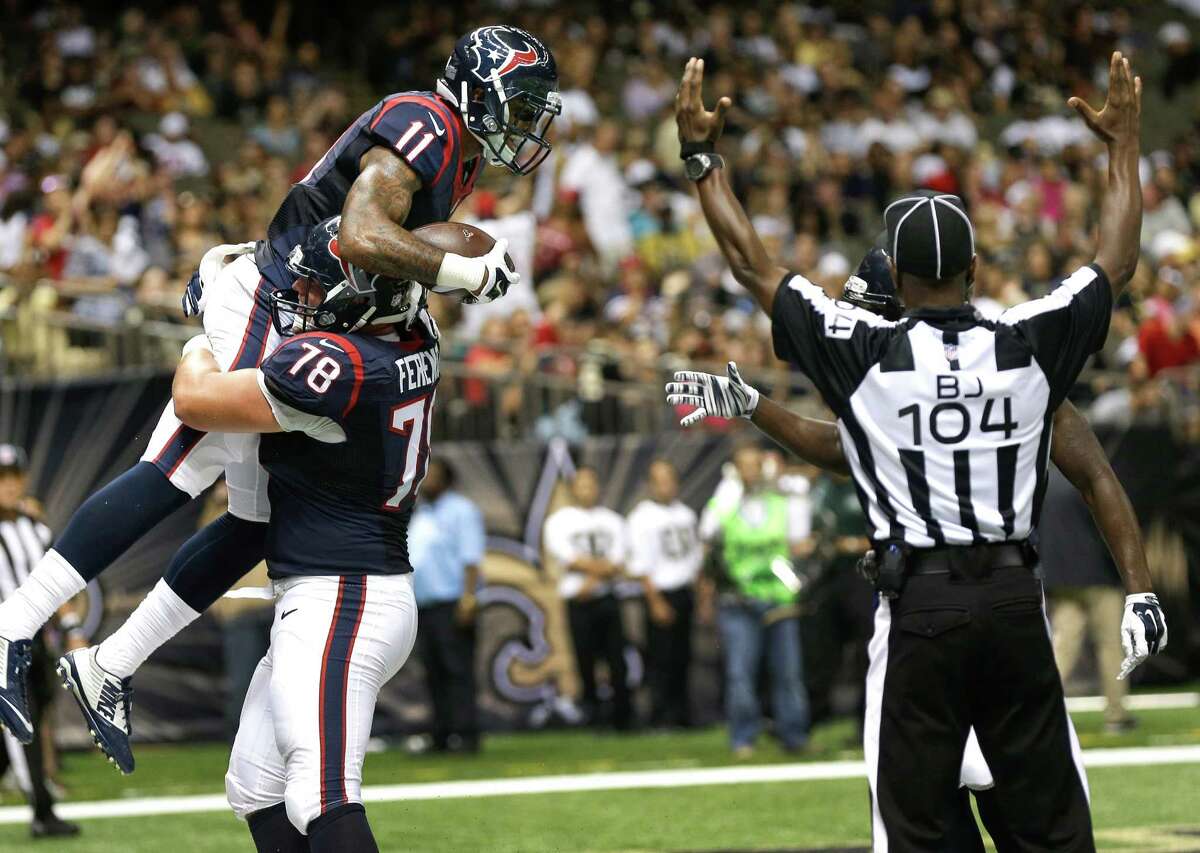 Texans wide receiver Jaelen Strong (11) is lifted into the air by center James Ferentz (78) as they celebrate Strong's 6-yard touchdown reception﻿ during the third quarter﻿.